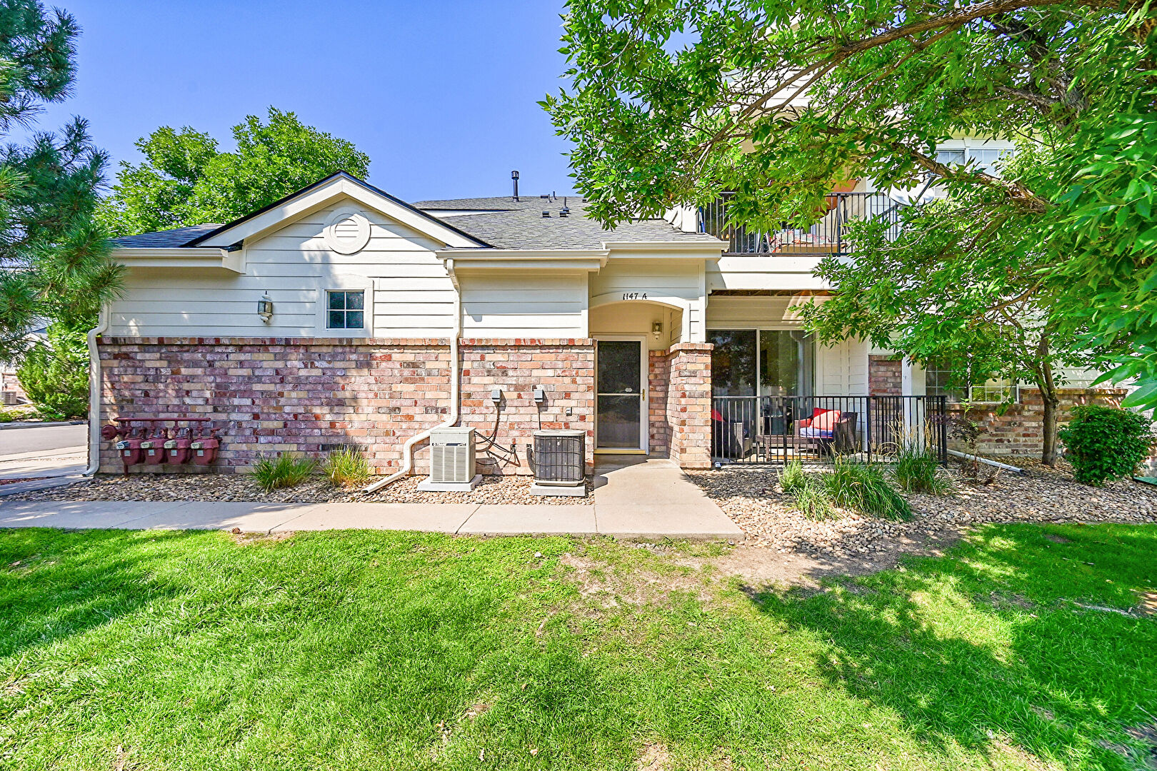 Front at 1147 South Alton Street, Denver, CO 80247, listed by Darin Underwood