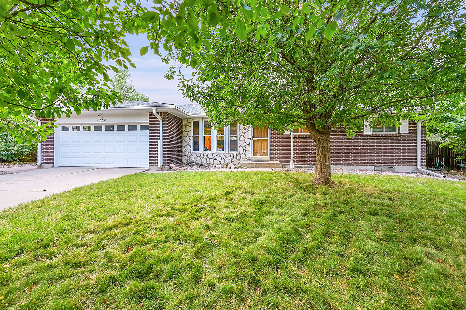 Front at 11562 W Temple Ave, Littleton, CO 80127, listed by Justin Bourn
