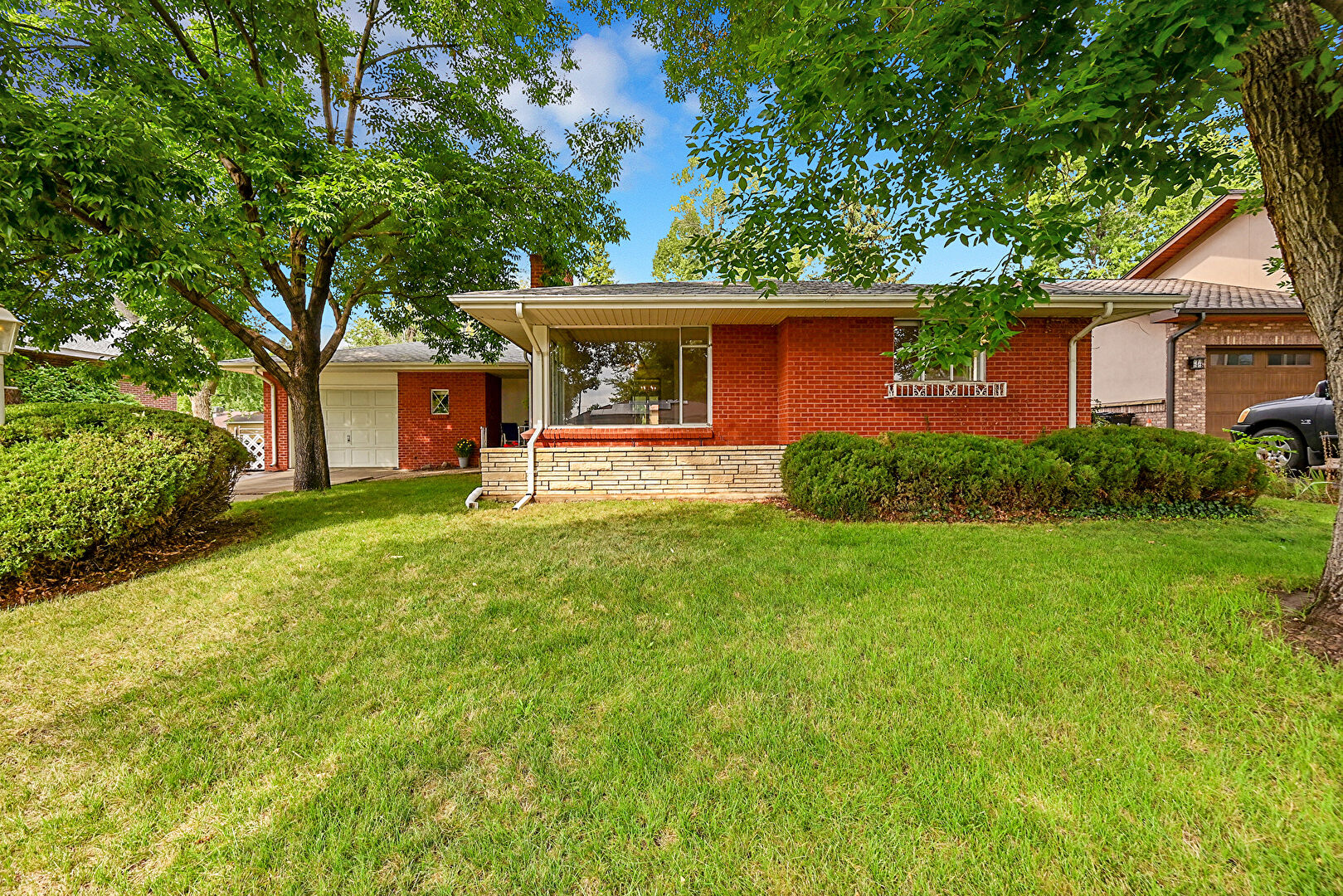 Front at 6949 Upham Street, Arvada, CO 80003, listed by Eric Carlton