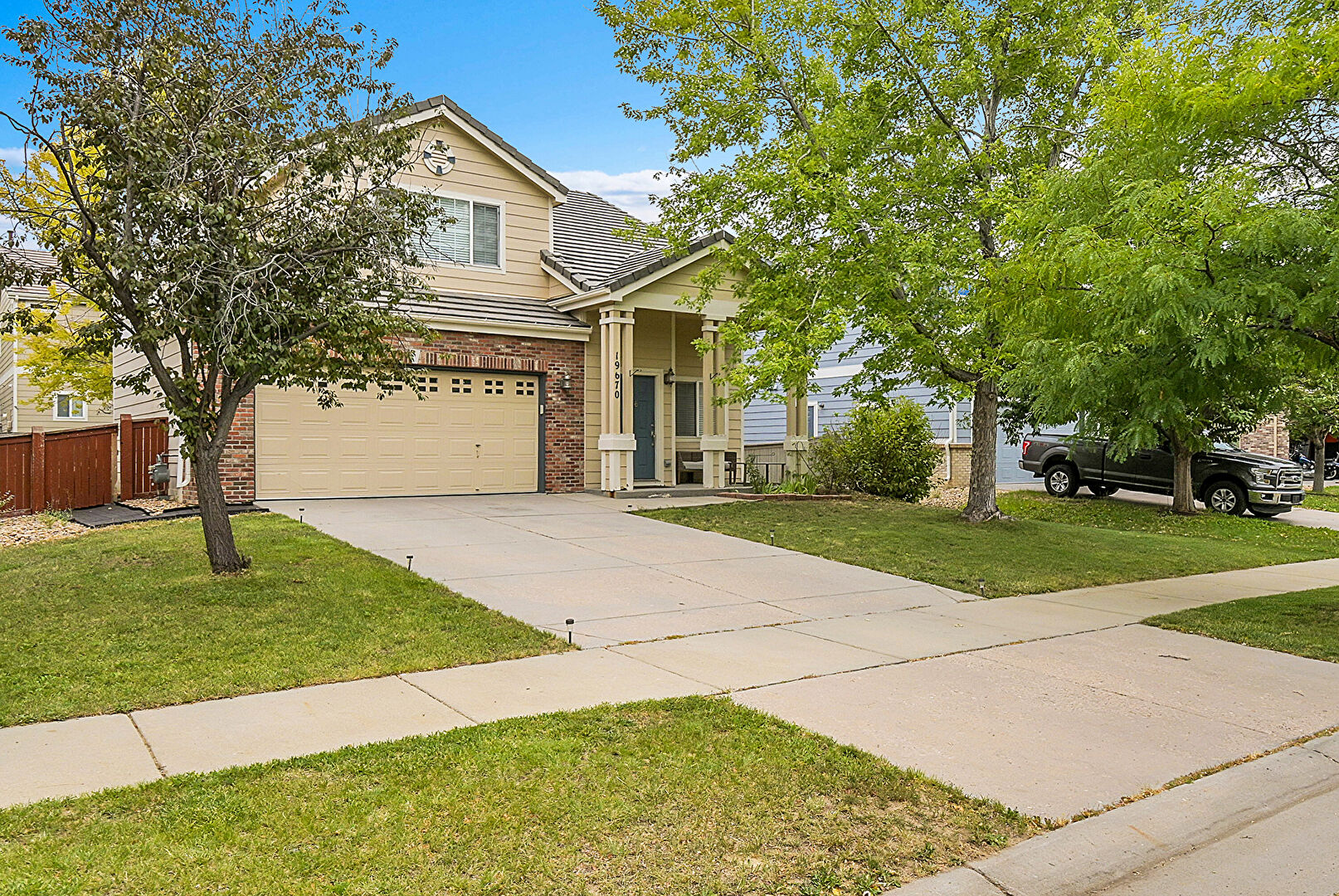 Front at 19670 East 59th Drive, Aurora, CO 80019, listed by Jessica Almaraz