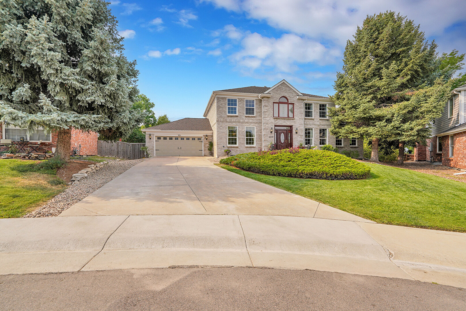Front at 2226 Thistle Ridge Circle, Littleton, CO 80126, listed by Mark Grandchamp