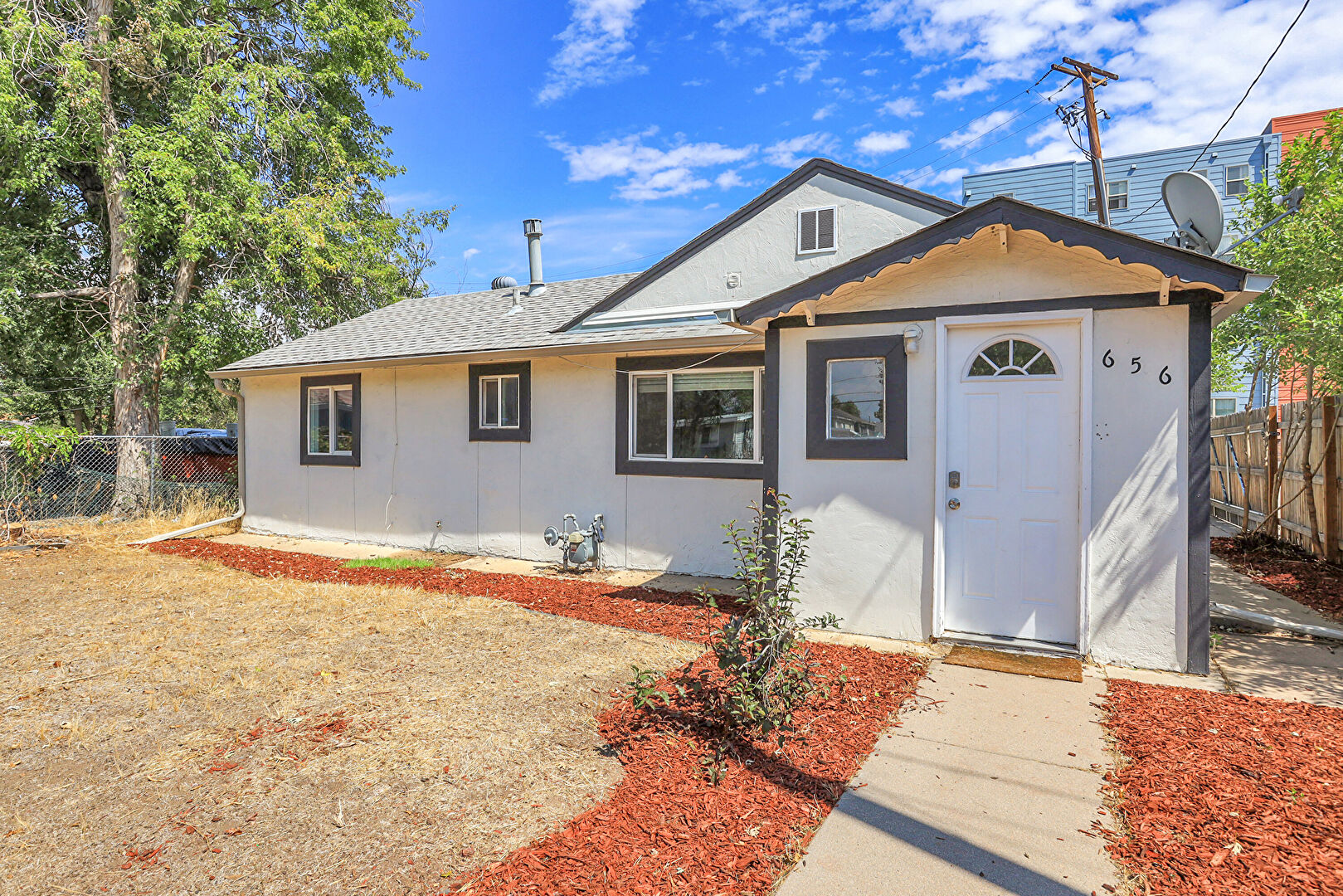 Front at 656 S Stuart St., Denver, CO 80218, listed by Valerie Skorka Westmark