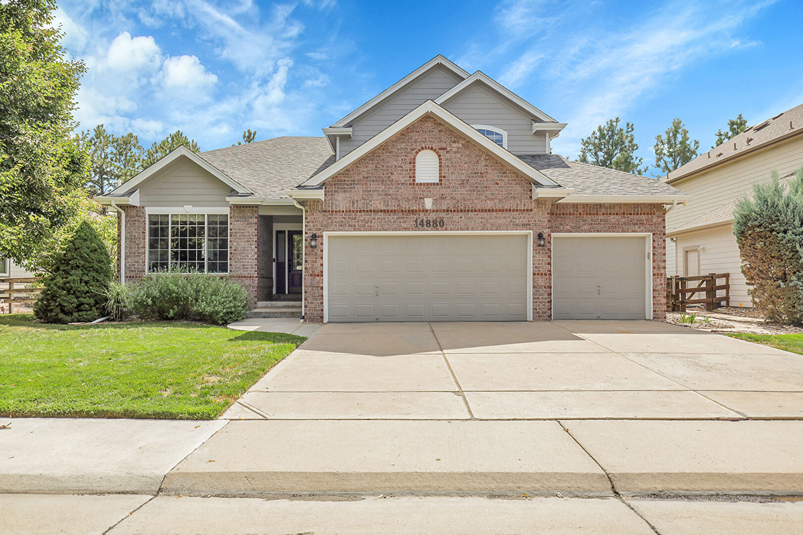 Front at 14880 East Maplewood Drive, Centennial, CO 80016, listed by Christie and Kelly