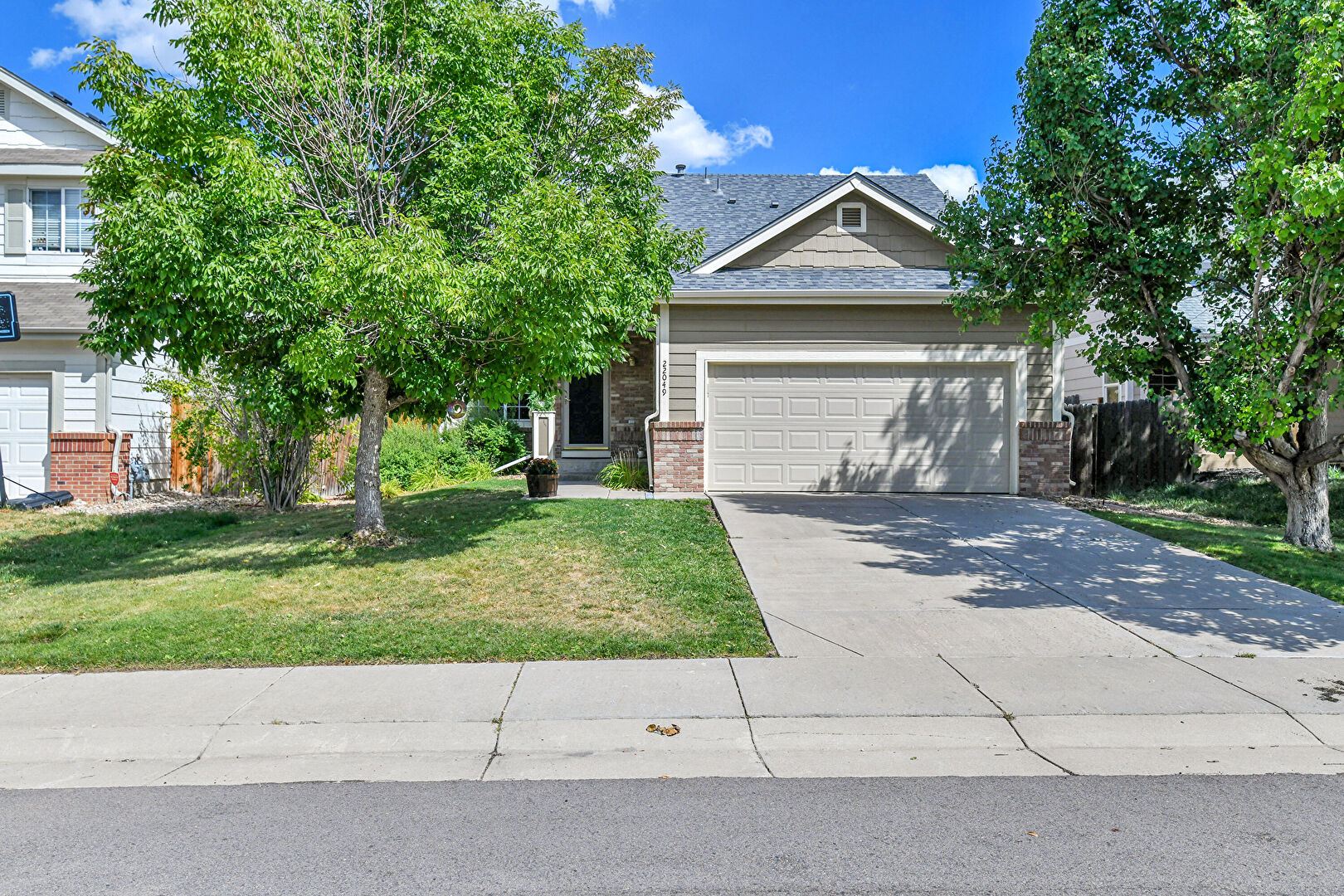 Front at 22049 East Princeton Circle, Aurora, CO 80018, listed by Terry Miller