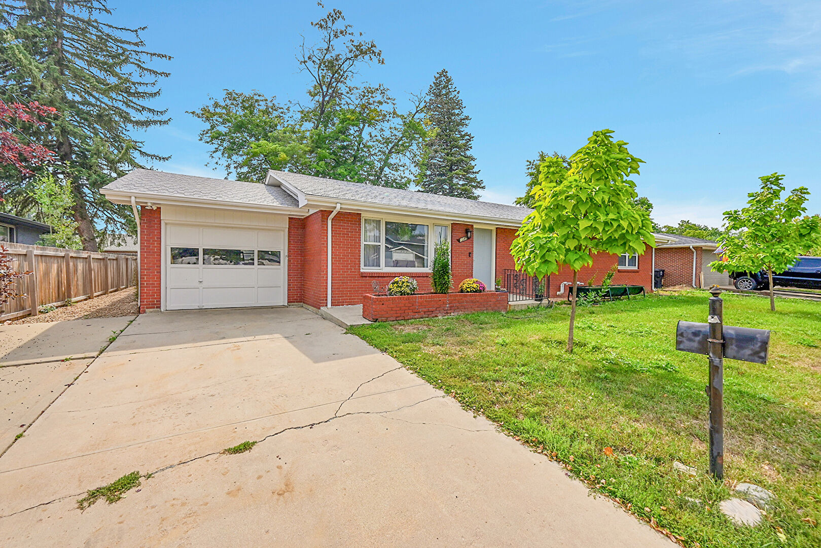 Front at 1345 Northwestern Road, Longmont, CO 80503, listed by Julio Quezada