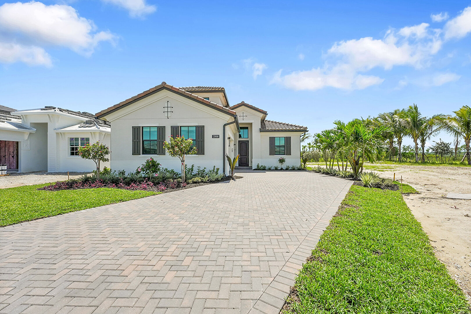 Front at 13908 Vivant Drive, Palm Beach Gardens, FL 33412, listed by Ravi Mohanka