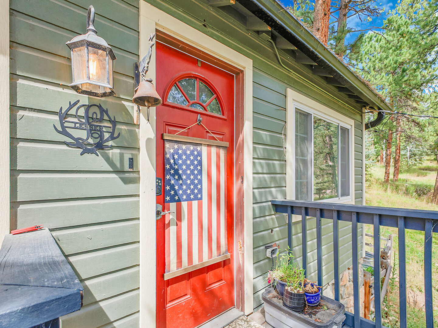Exterior Entry at 6999 South Columbine Road, Evergreen, CO 80439, listed by Sarah Lesser