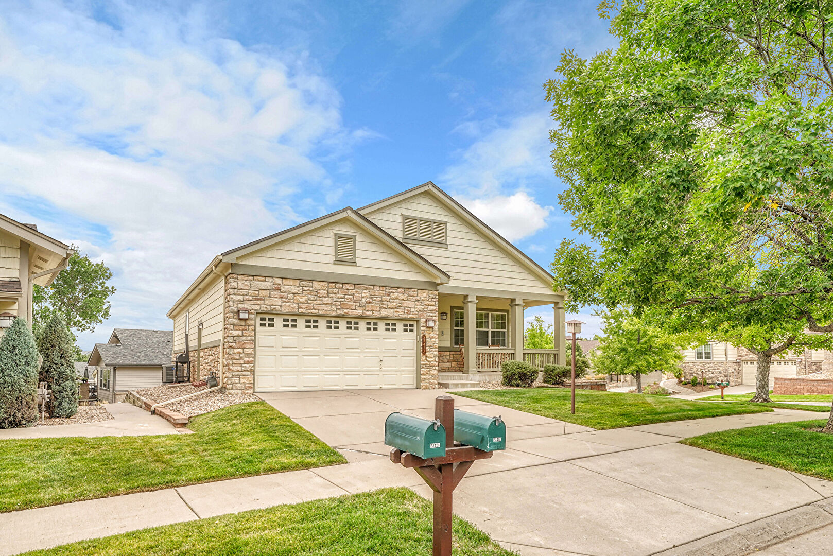 Front at 23418 East Long Place, Aurora, CO 80016, listed by Christopher Kiker