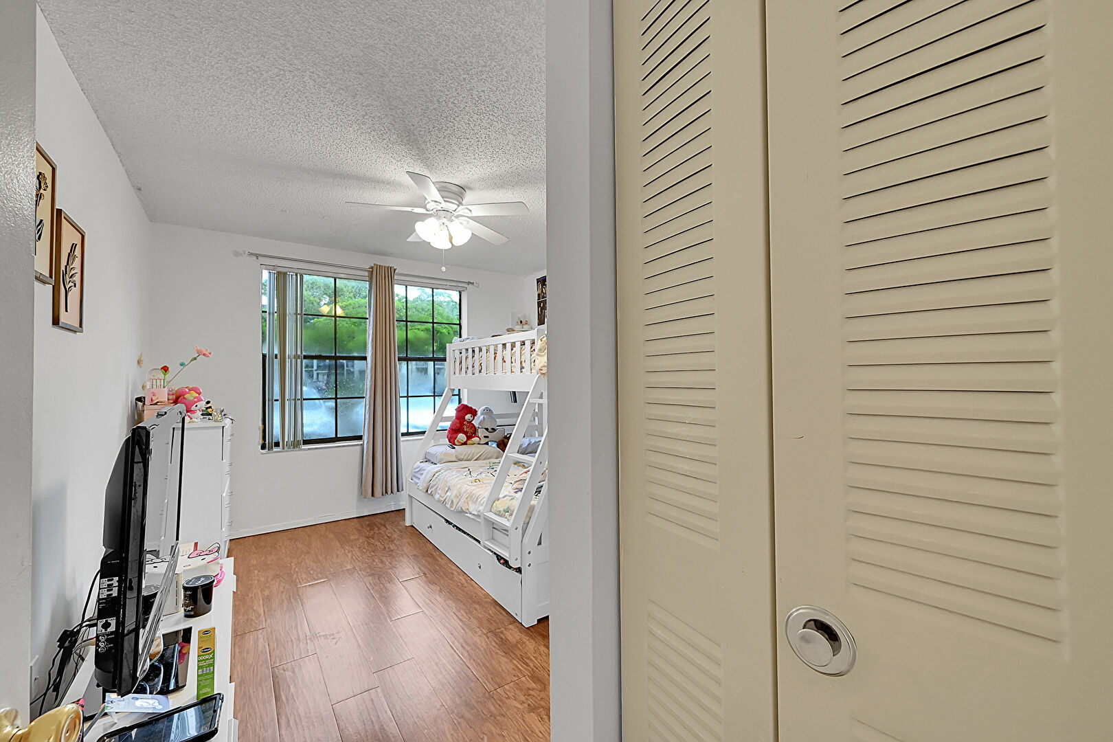 Bedroom at 11245 West Atlantic Boulevard, Coral Springs, FL 33071, listed by Michael Clemente