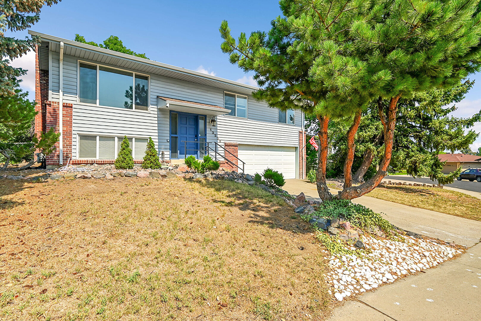 Front at 13233 West Utah Circle, Lakewood, CO 80228, listed by Victoria Merchant