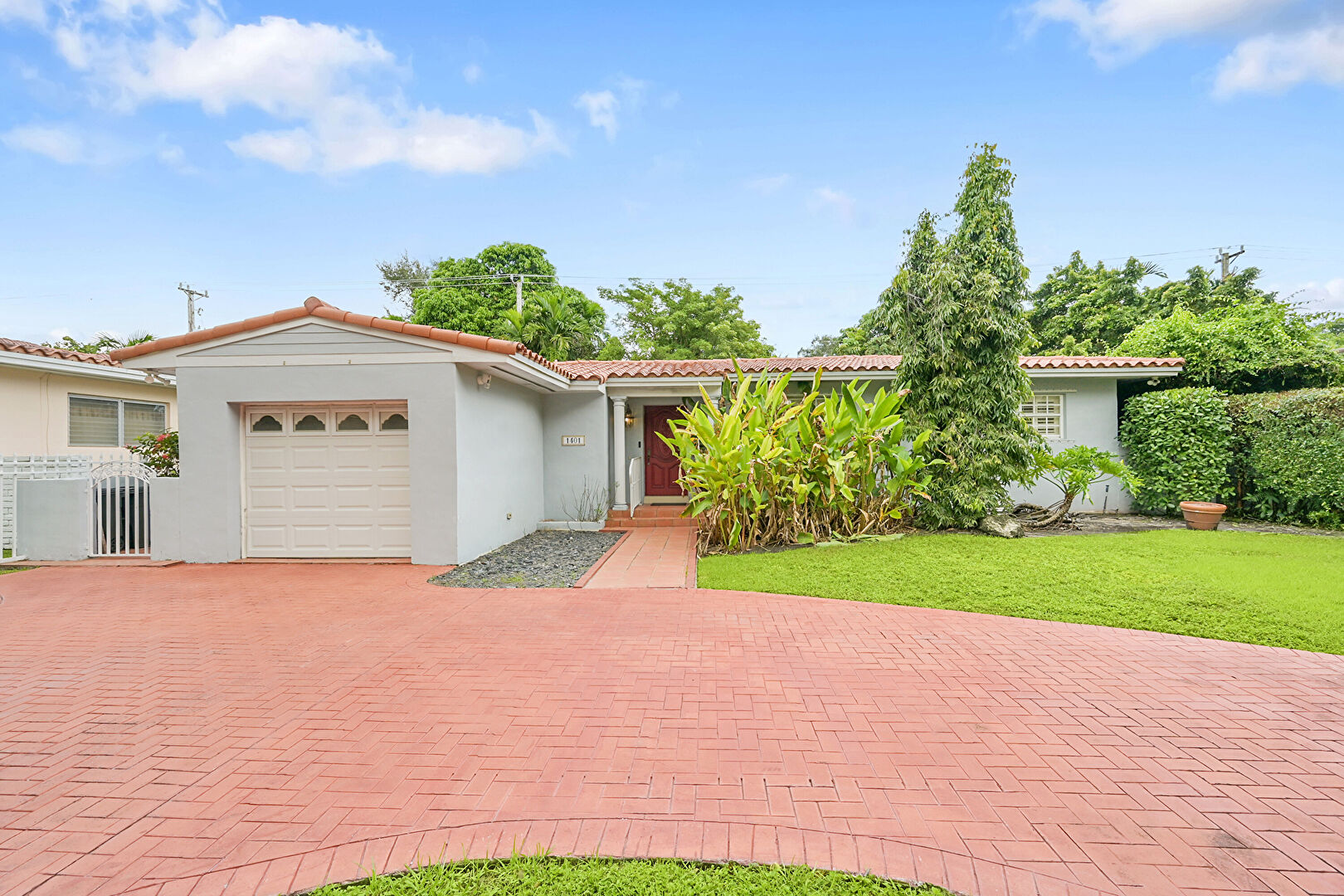 Front at 1401 Red Road, Miami, FL 33144, listed by Rachael Barach