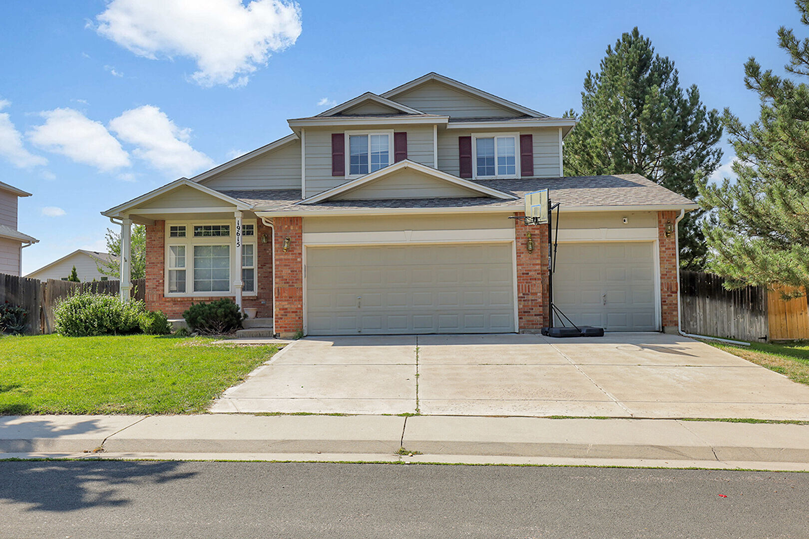 Front at 19615 East Caspian Circle, Aurora, CO 80013, listed by Kahsay Abraham, MLS ID: 4429584