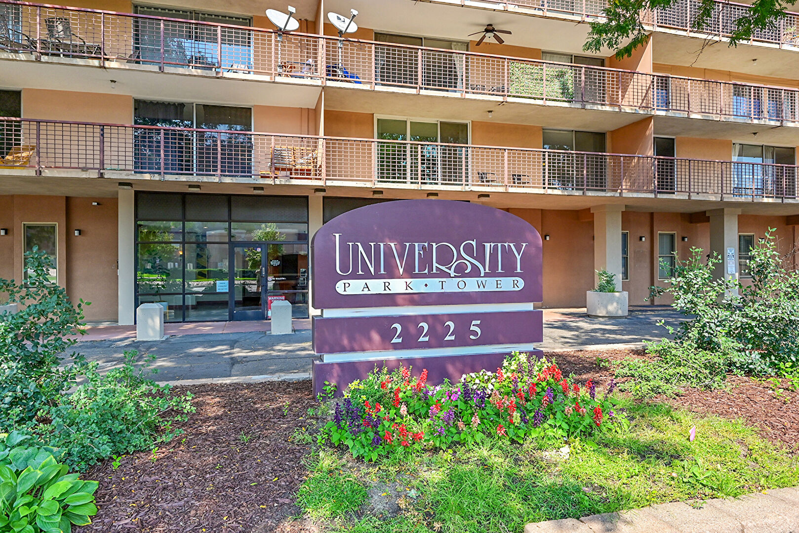 Community Sign at 2225 Buchtel Boulevard Unit 1011, Denver, CO 80210, listed by J. Ceja Jr.