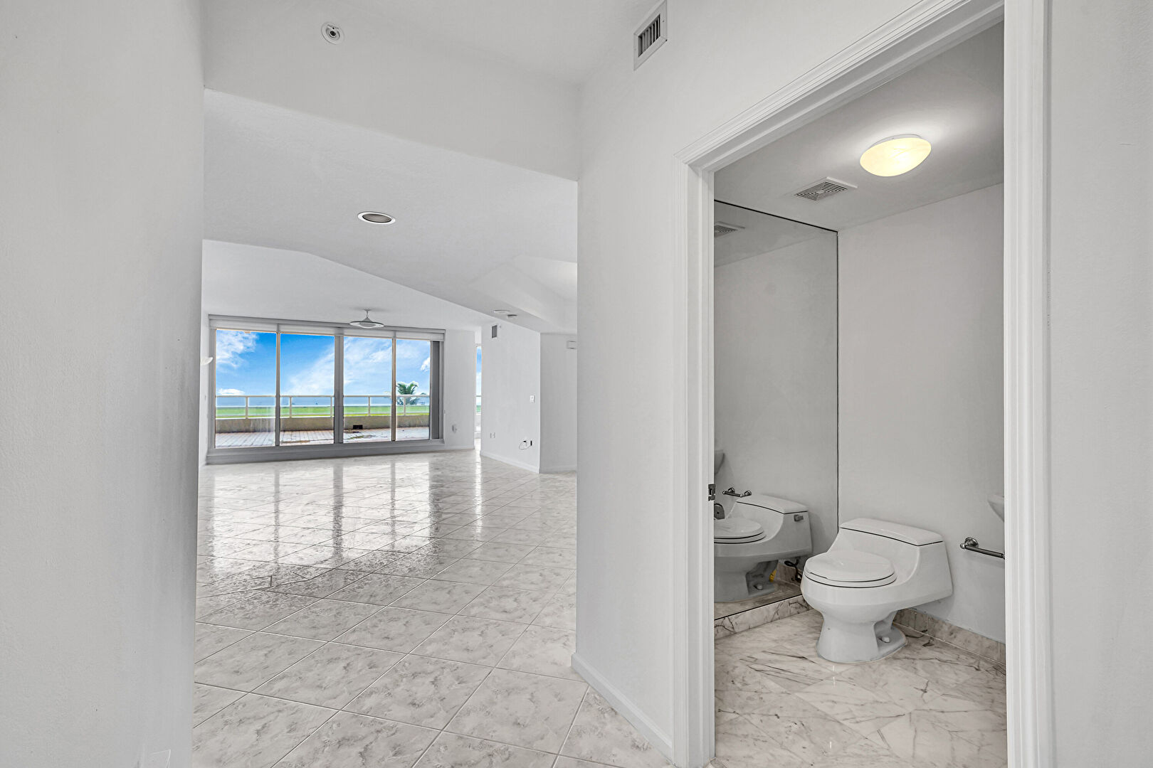 Foyer at 6001 N Ocean Dr, Apt 306, Hollywood, FL 33019, listed by Scott Ryan