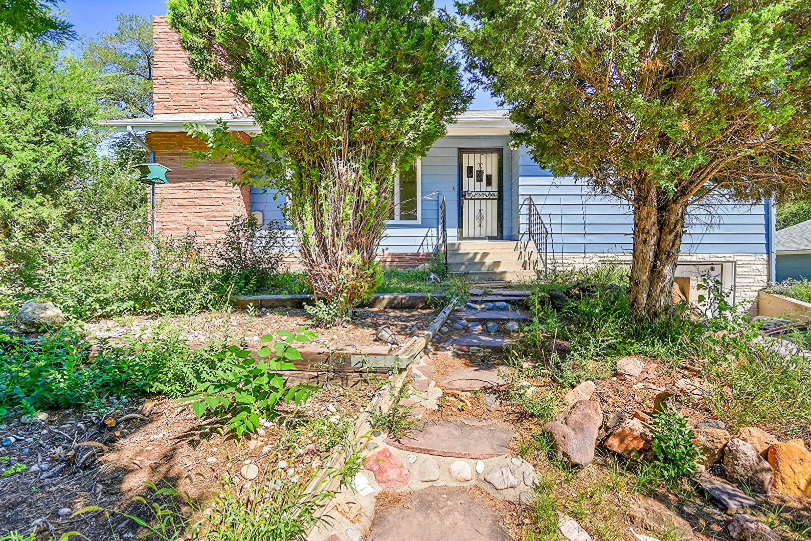 Front yard at 224 West Navajo Street, Upstairs, Colorado Springs, CO 80905, listed by Brenna Frane