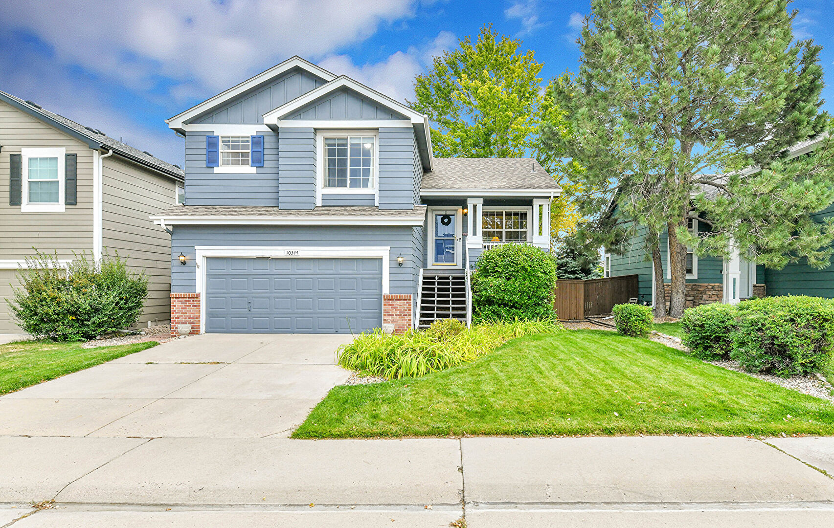Front at 10344 South Ravenswood Lane, Highlands Ranch, CO 80130, listed by Robert Brainard