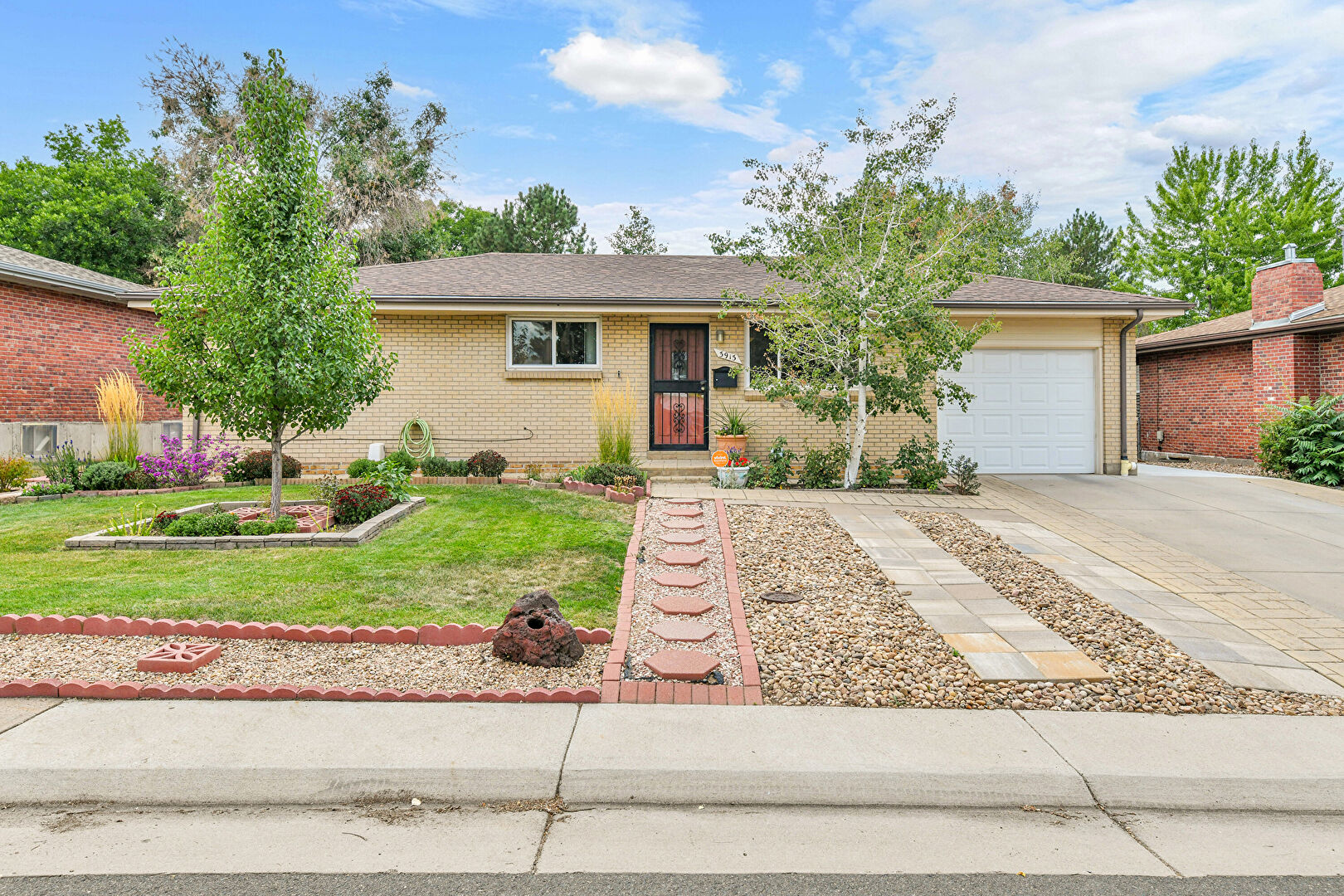 Front at 3913 South Grove Street, Englewood, CO 80110, listed by Jessica Almaraz