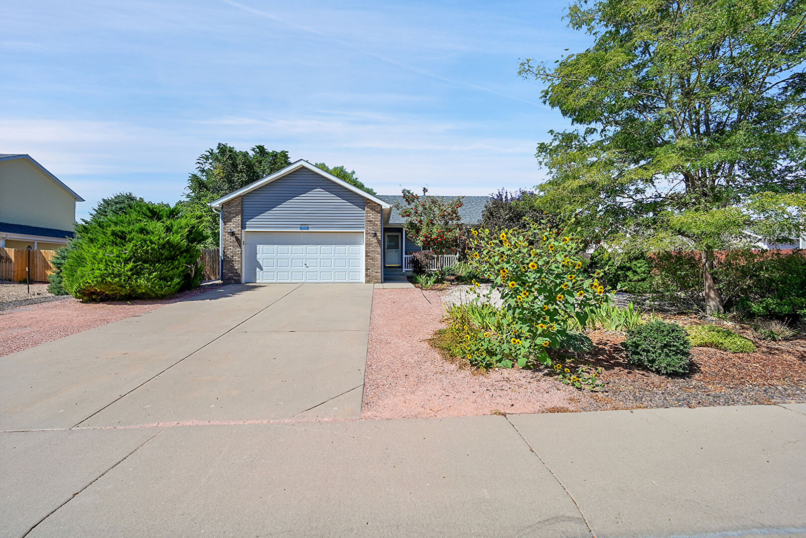 Front at 3911 24th Avenue, Evans, CO 80620, listed by Brad Inhulsen