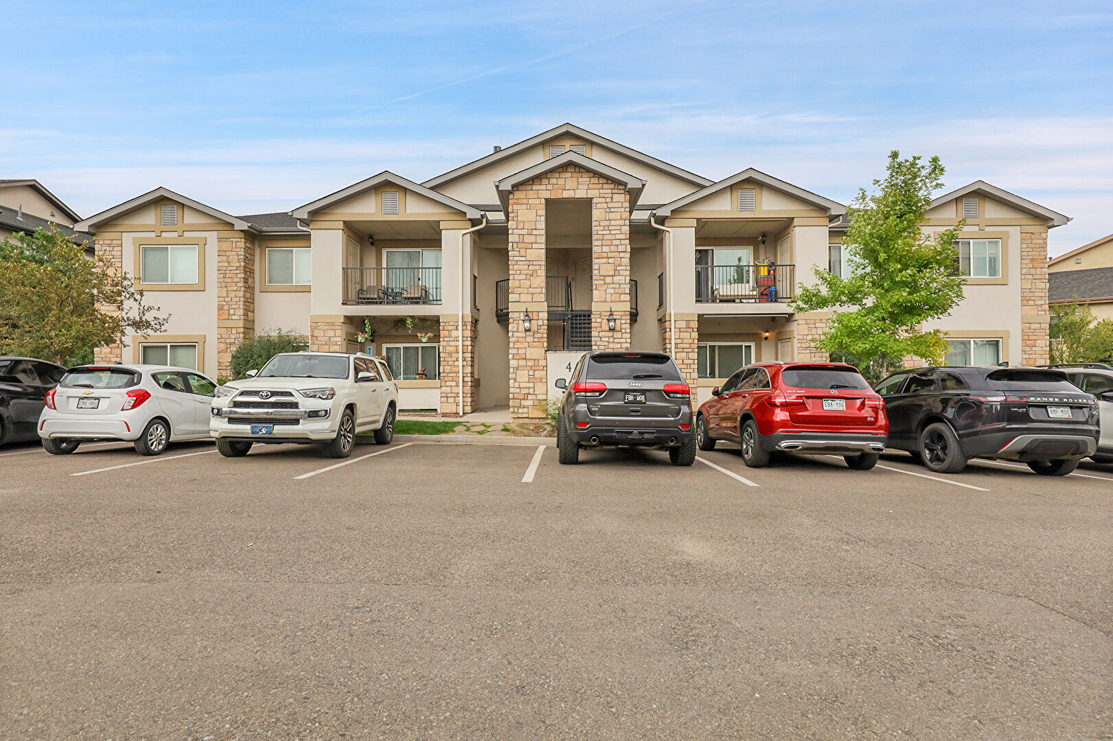 Front of Structure at 875 East 78th Avenue, Building 4, Unit 30, Denver, CO 80229, listed by Seyla Choban