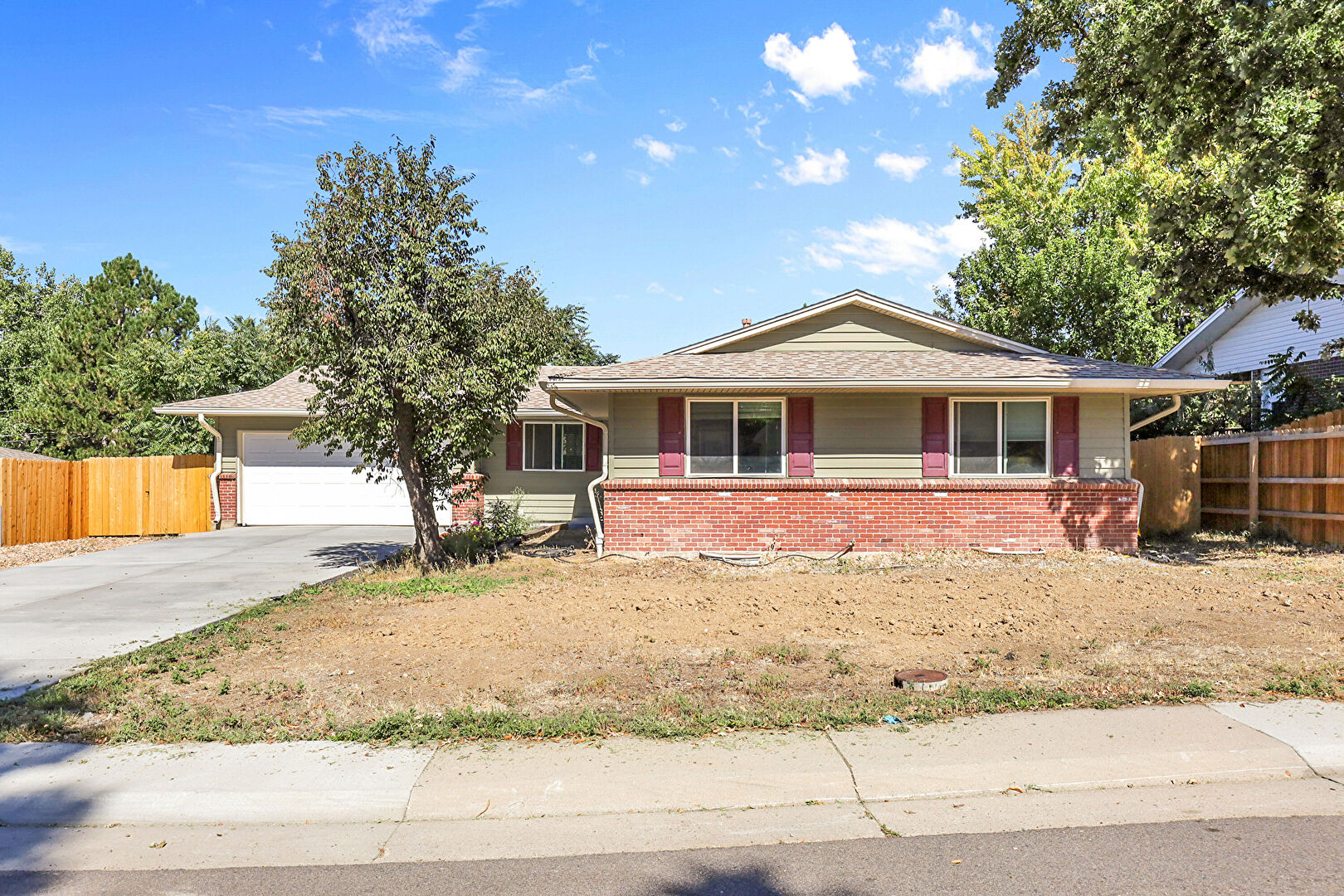 Front at 6945 South Ulster Circle, Centennial, CO 80112, listed by Luke Brenning