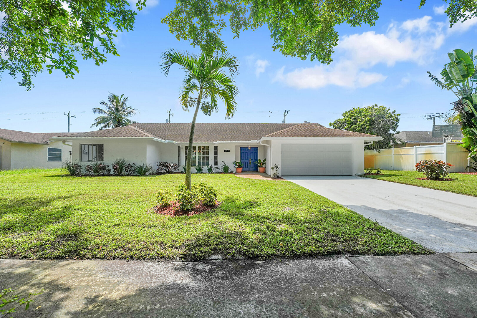 Front at 2114 Echo Lake Drive, West Palm Beach, FL 33407, listed by Nicholas McDonald