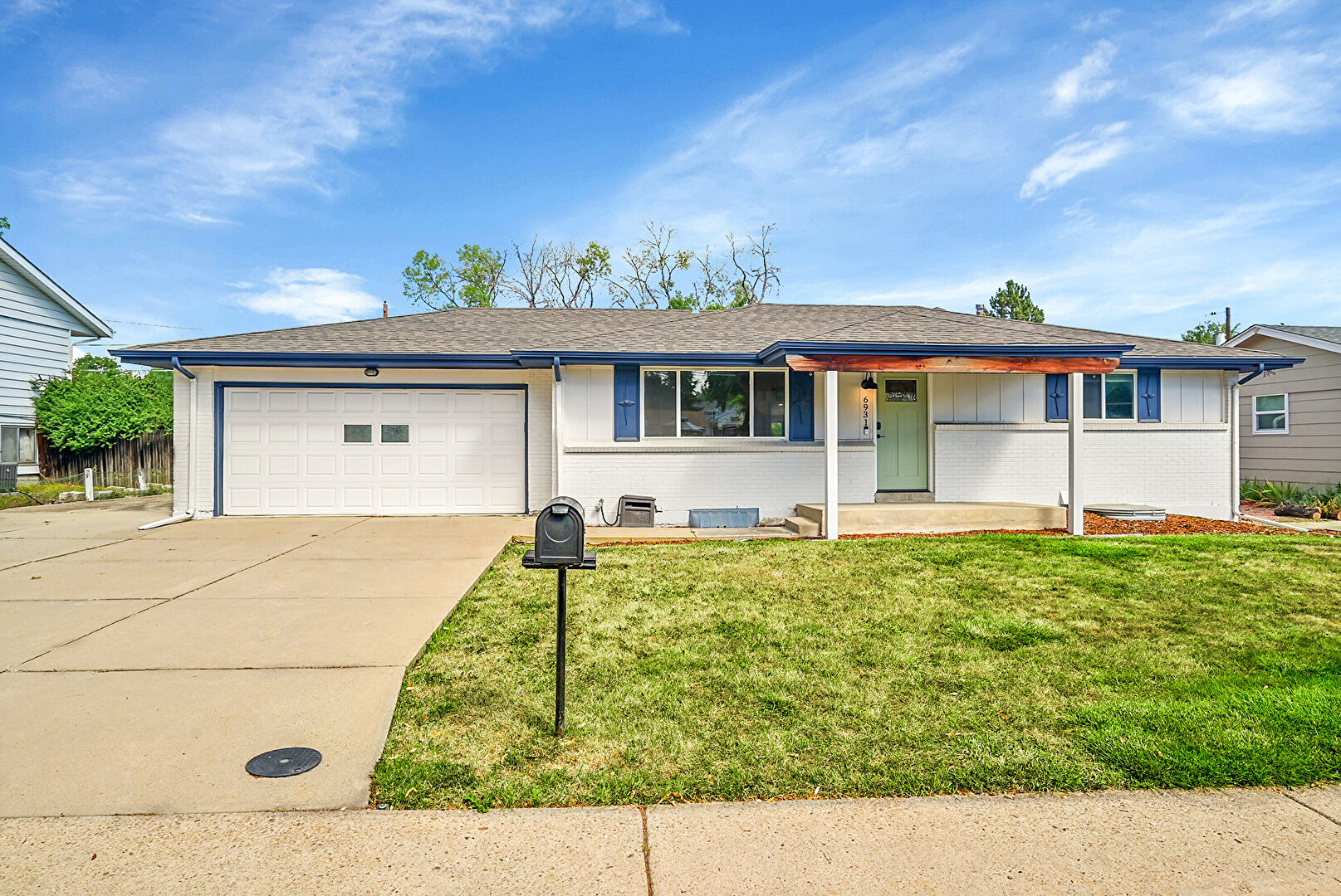 Front at 6931 West 75th Place, Arvada, CO 80003, listed by Taylor Haas