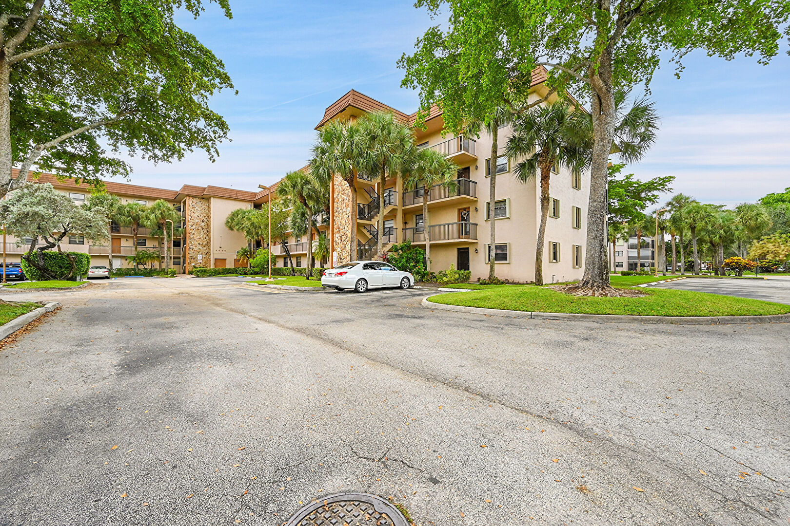 Front at 4940 East Sabal Palm Boulevard, Unit 202, Tamarac, FL 33319, listed by Laura Sanders, MLS ID: F10525597