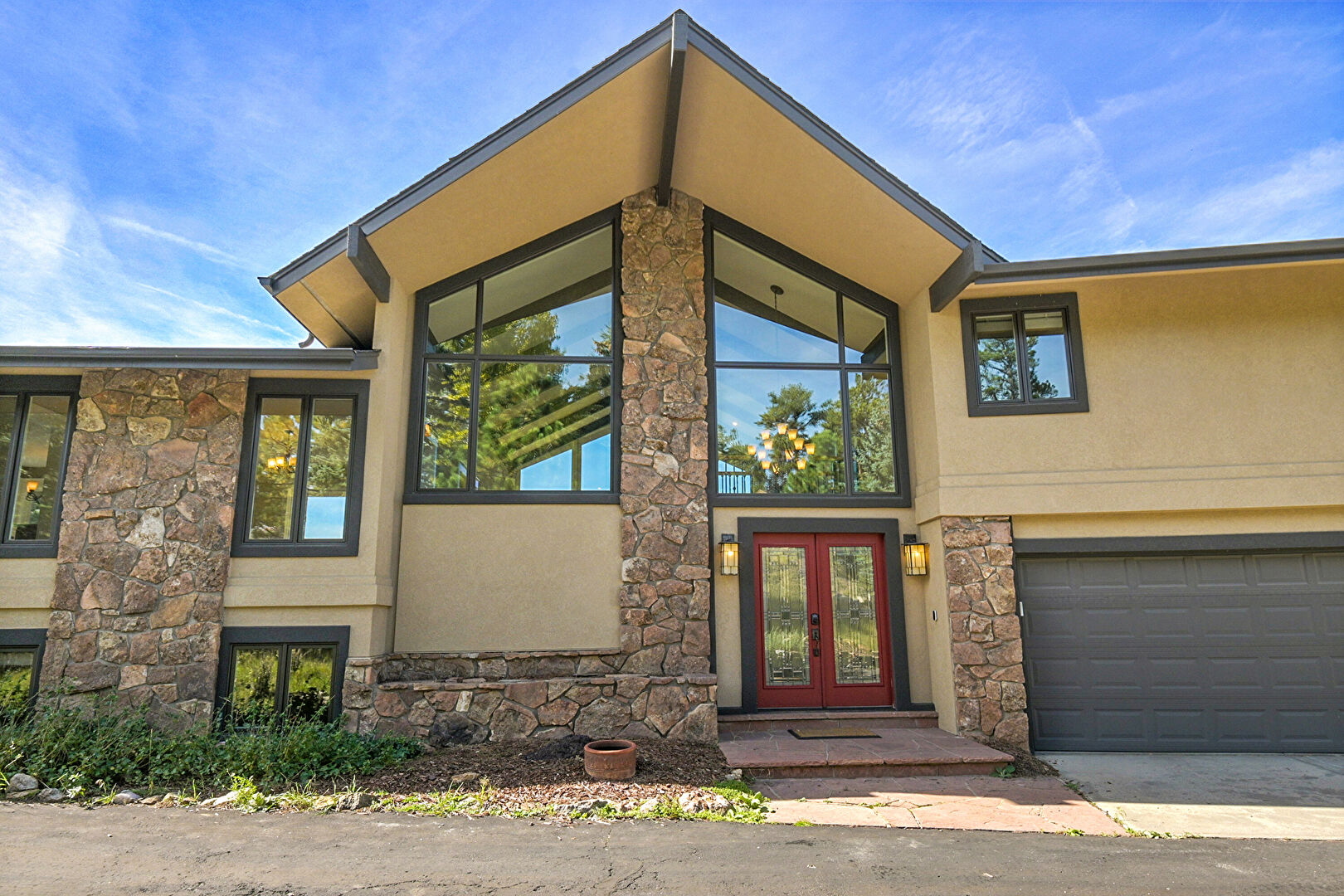 Exterior Entry at 31340 Brookline Road, Evergreen, CO 80439, listed by Sandra Bosworth