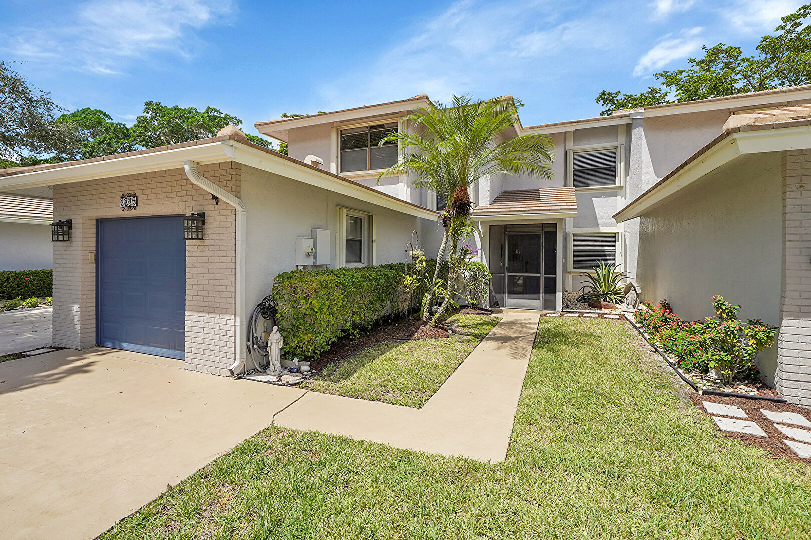 Front at 3335 Lakeshore Drive, Deerfield Beach, FL 33442, listed by Claudia  Evan