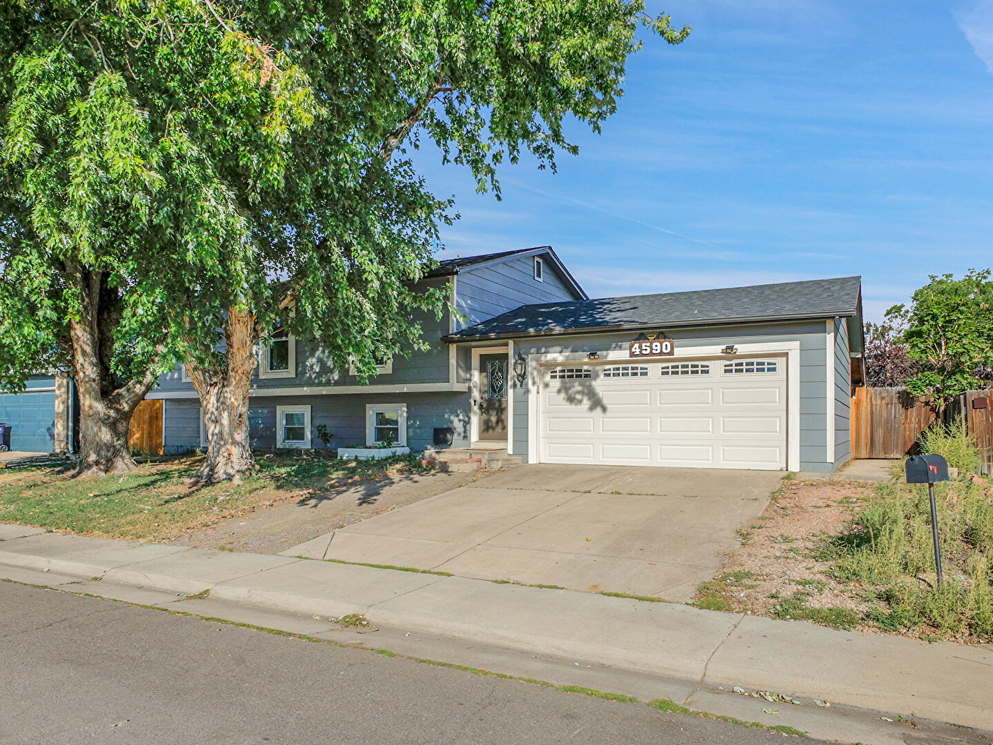 Front at 4590 Fraser Way, Denver, CO 80239, listed by Tania Carter