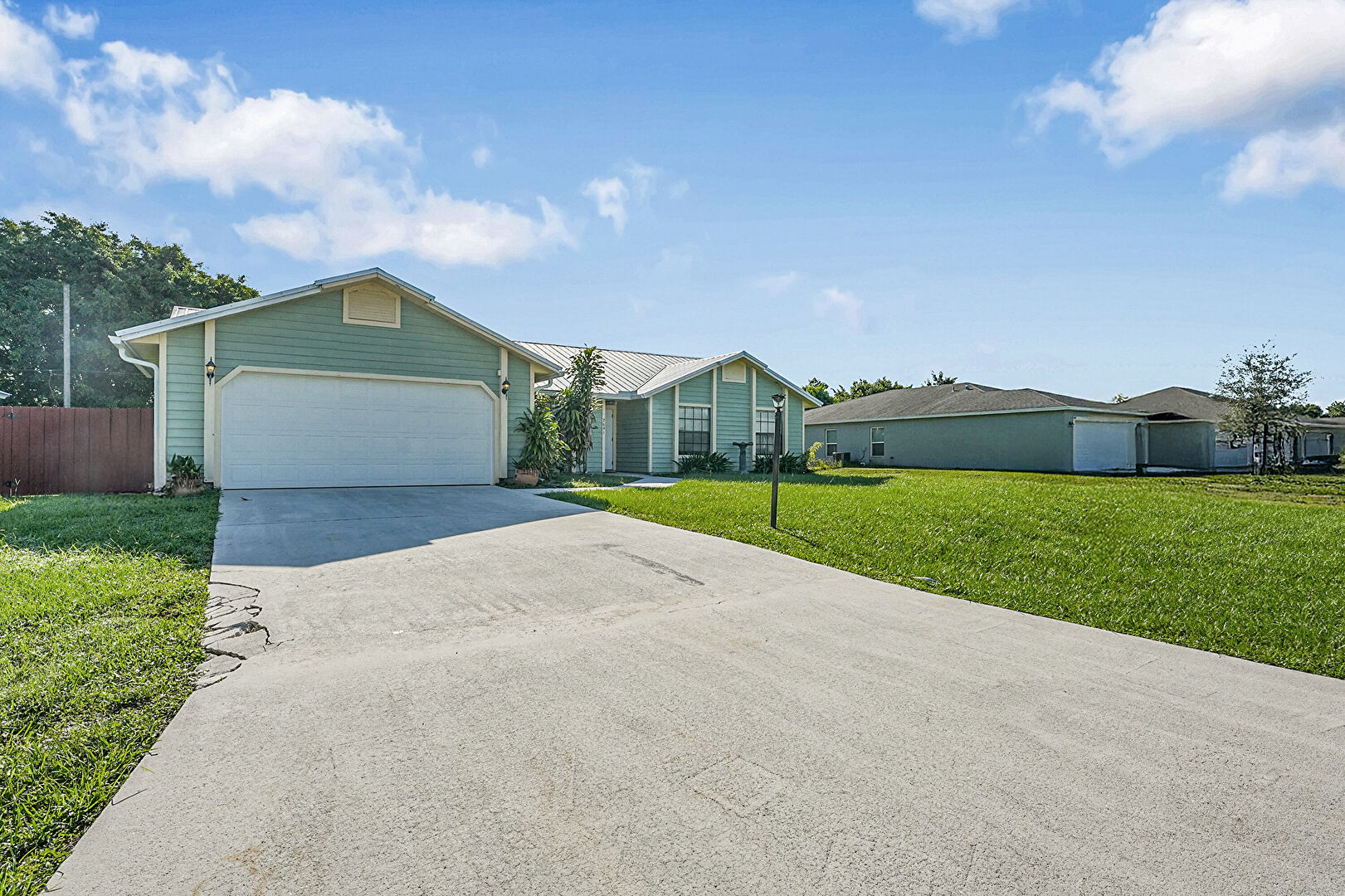 Front at 2641 Southwest Eastman Street, Port St. Lucie, FL 34953, listed by Margaret Good