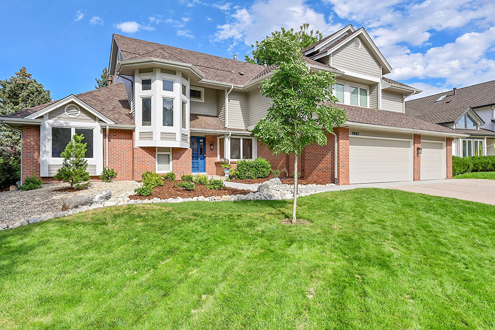 Front at 7937 South Clayton Circle, Centennial, CO 80122, listed by Christopher Kiker