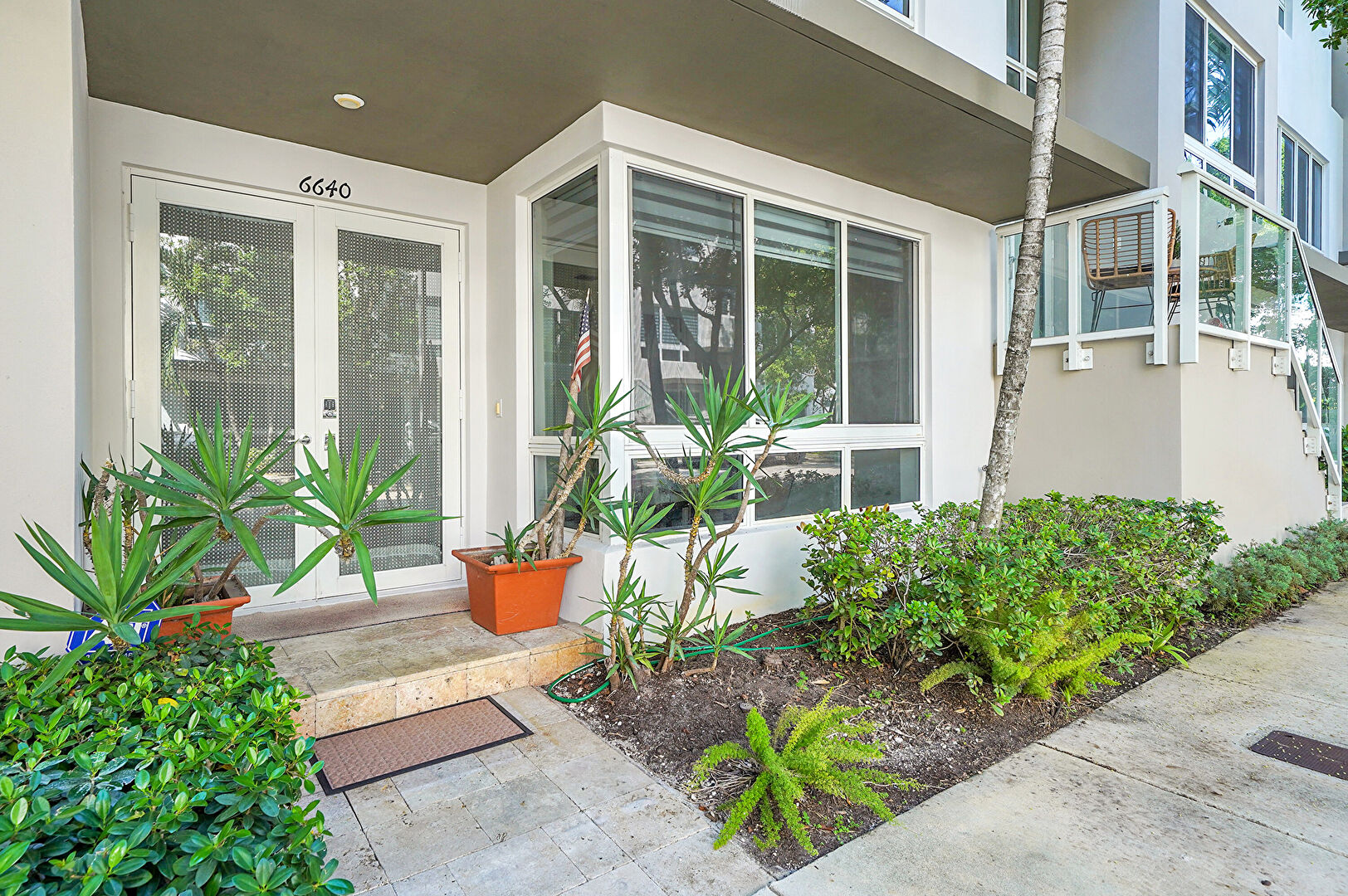Entry at 6640 Northwest 105th Place, Doral, FL 33178, listed by Ana Garcia