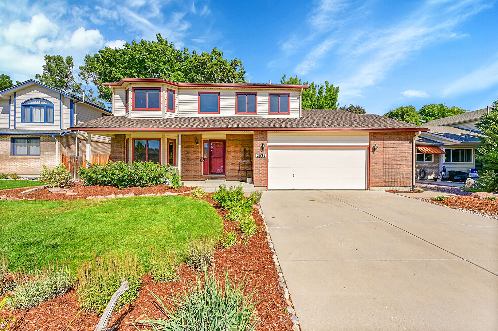 Front at 2634 Westlake Court, Longmont, CO 80503, listed by Marla Cody
