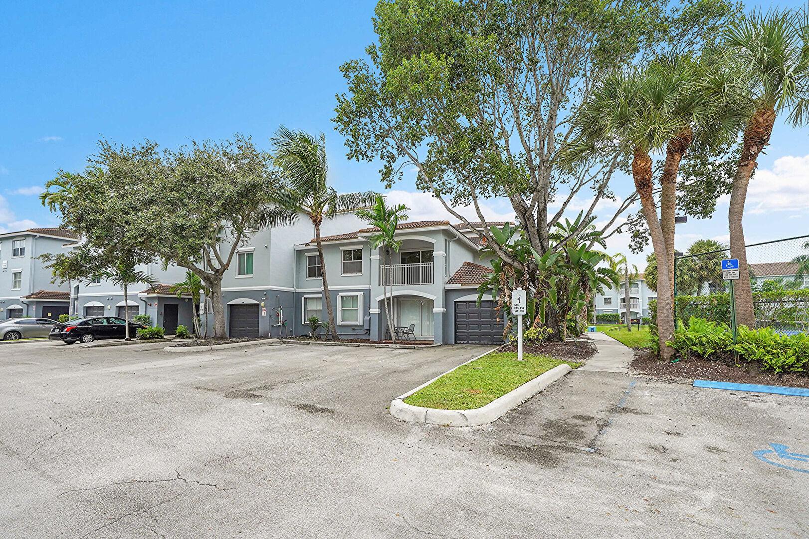 Front at 9645 NW 1st Ct #1-210, Pembroke Pines, FL 33024, listed by Earl Brown