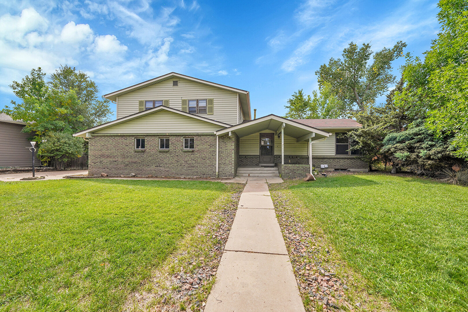 Front at 6432 West Alder Avenue, Littleton, CO 80128, listed by Renee Ambrose