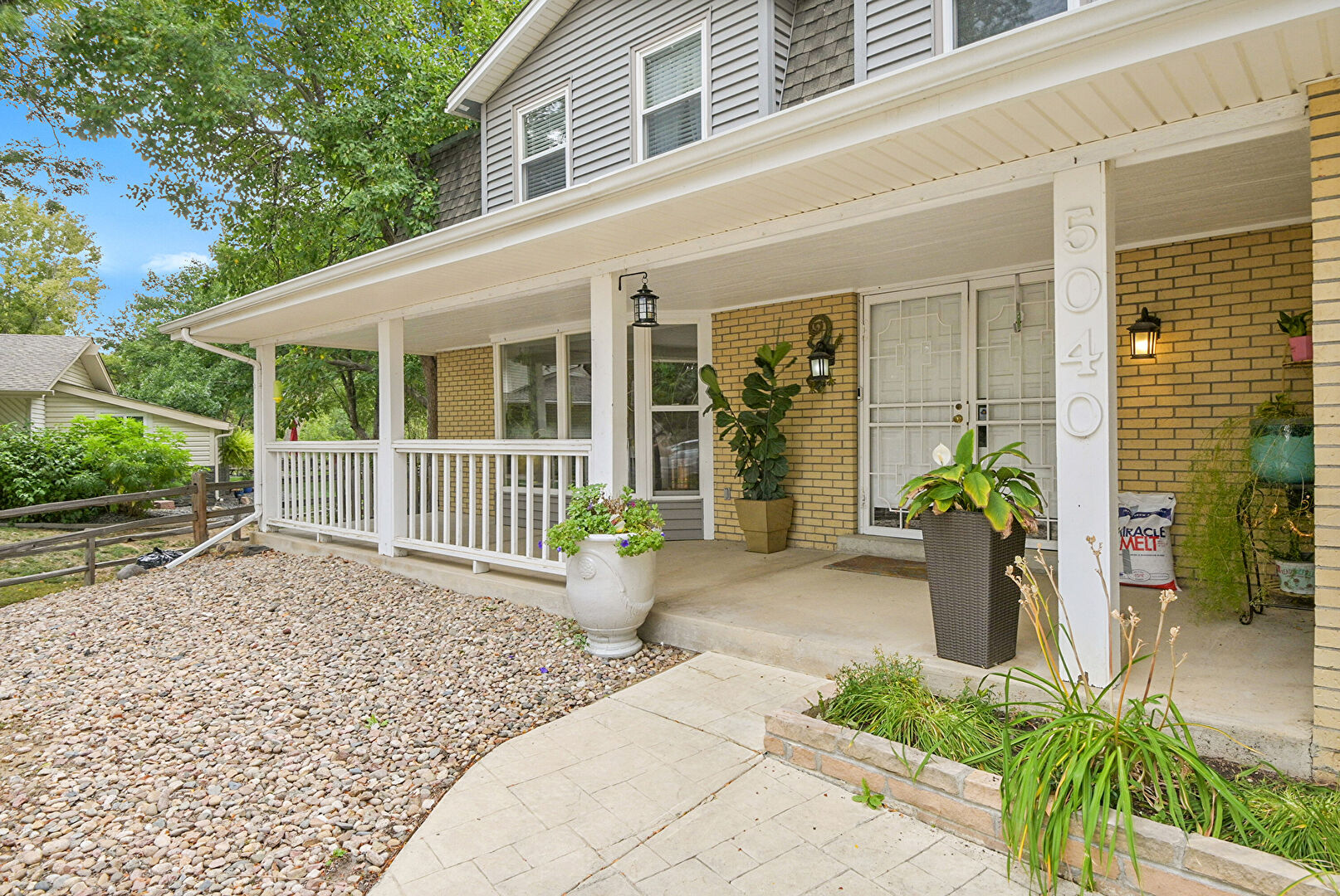 Exterior Entry at 5040 West 102nd Avenue, Westminster, CO 80031, listed by JOANITA SERWADDA