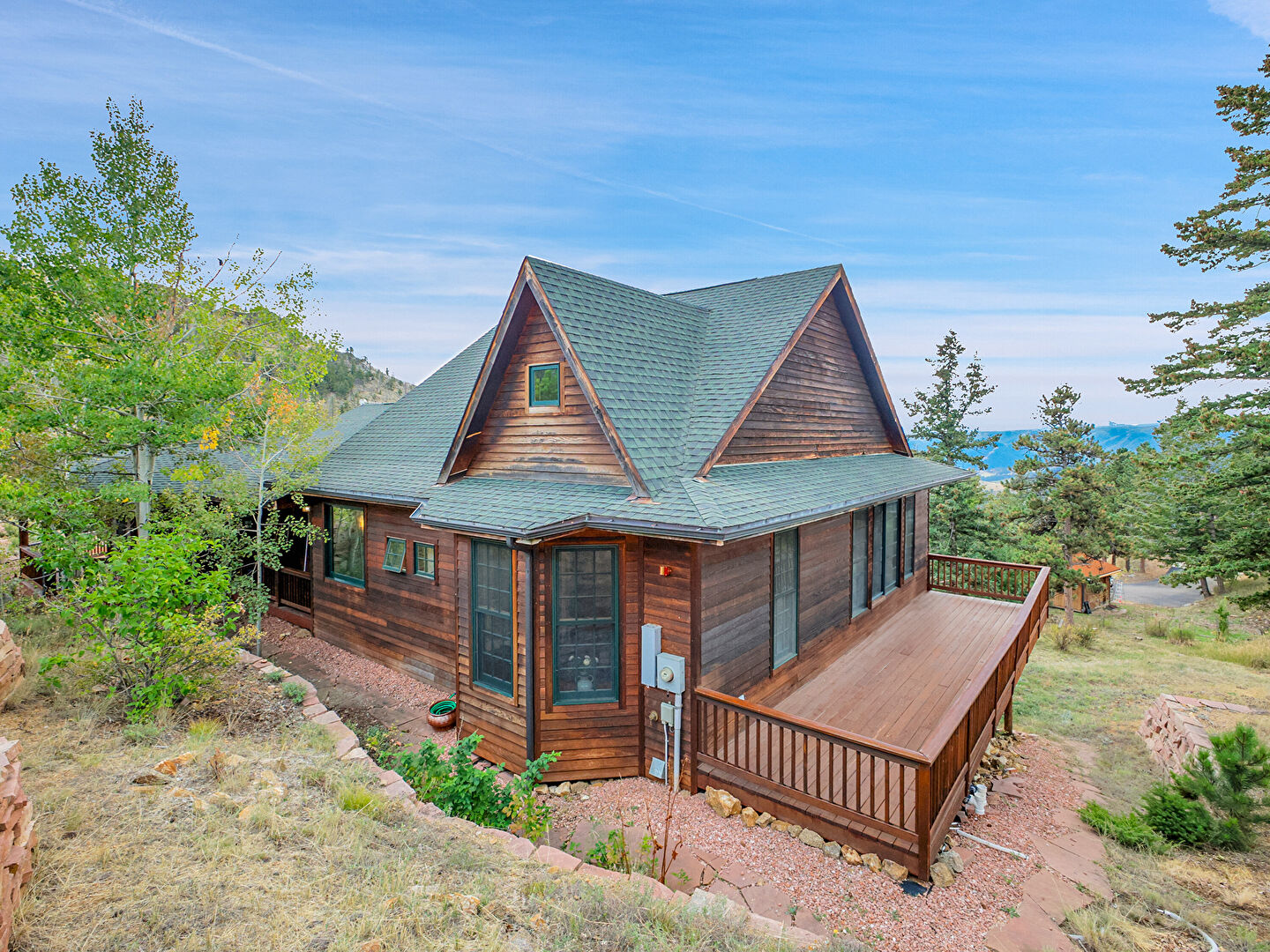 Front at 1689 County Road 83, Boulder, CO 80302, listed by Brooke Weathers