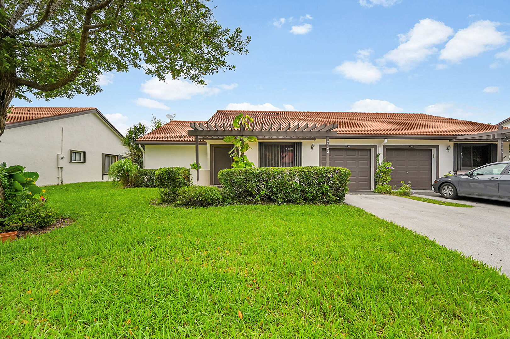 Front at 7142 Brookwood Boulevard, Tamarac, FL 33321, listed by Bing Wang