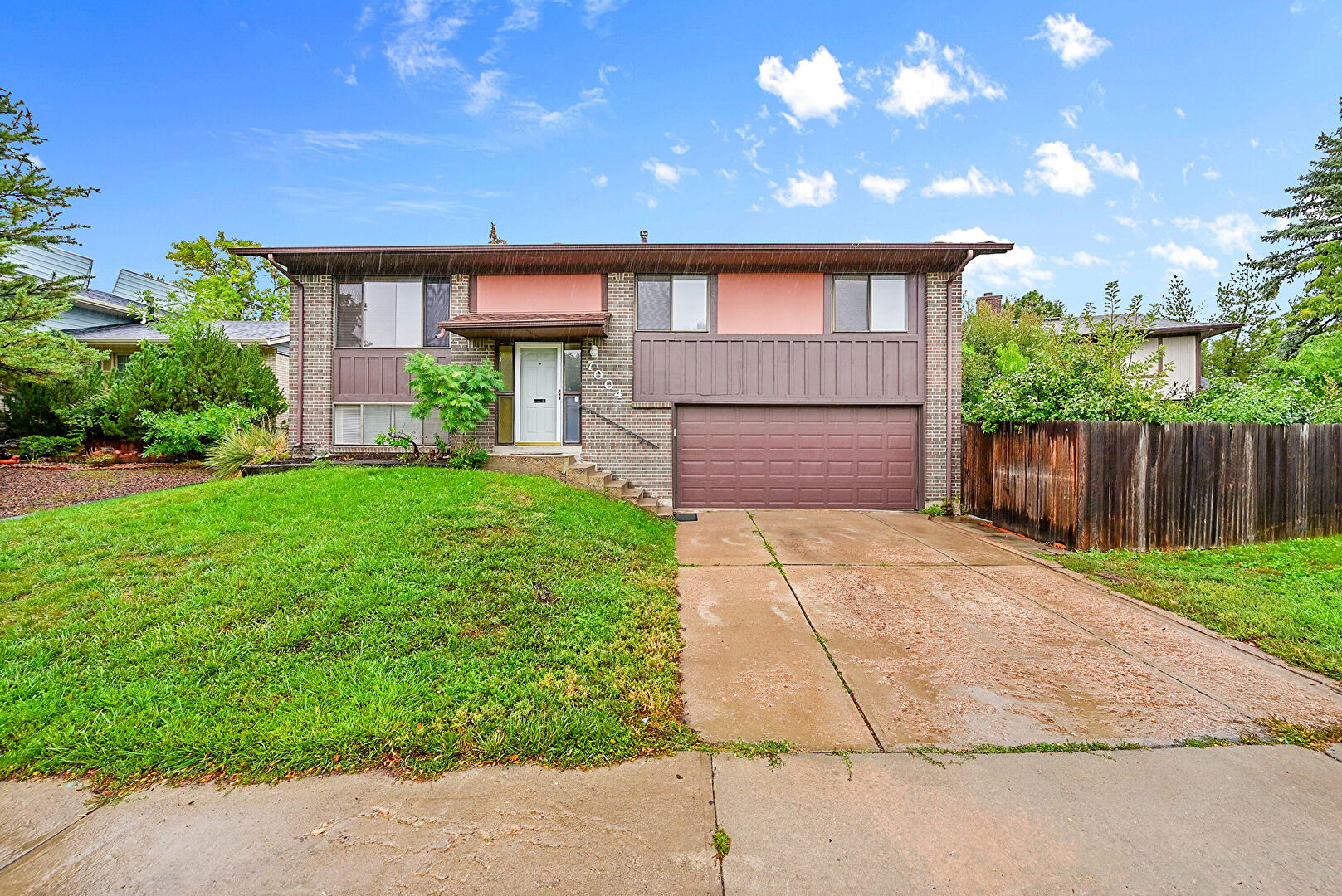 Front at 7004 East Warren Drive, Denver, CO 80224, listed by Colleen Simpson