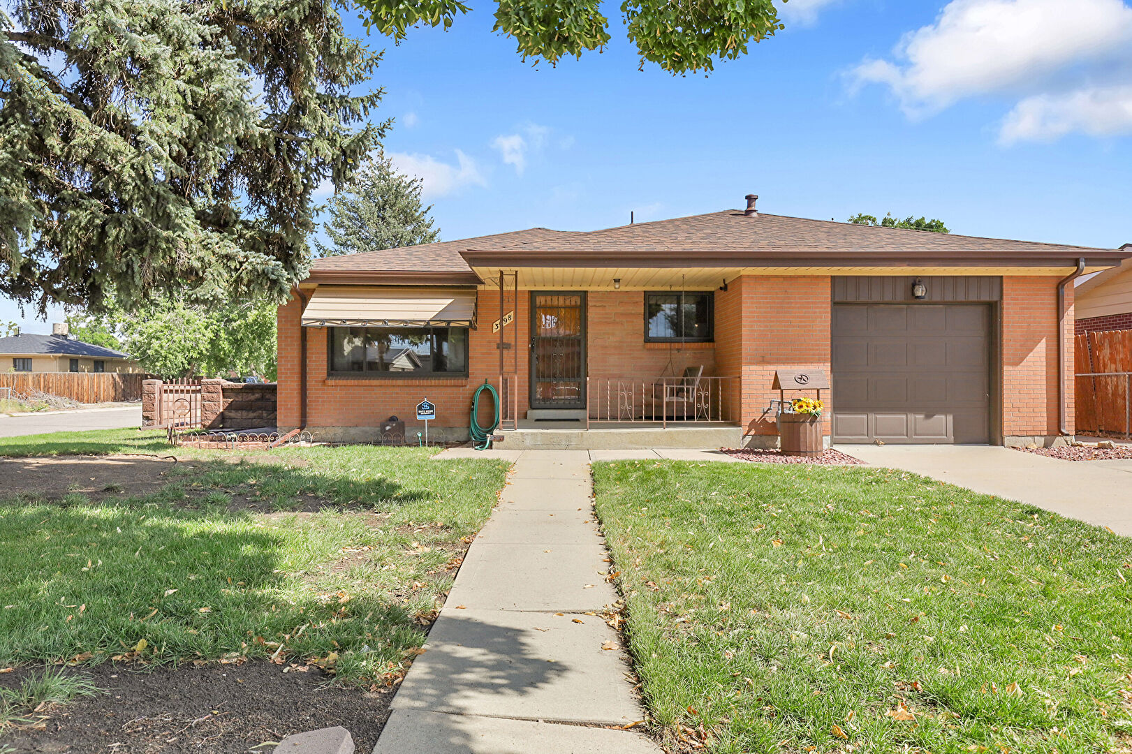 Front at 3098 Zion Street, Aurora, CO 80011, listed by Beth Gibson, MLS ID: 4320629