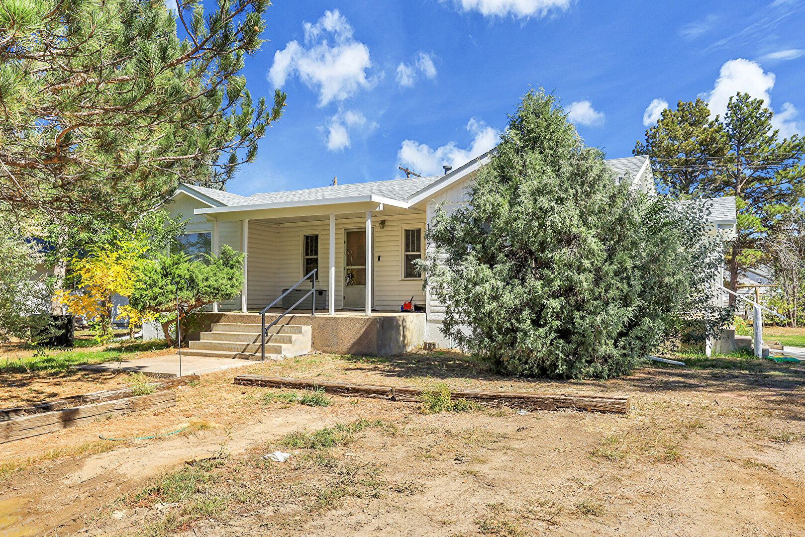 Front at 1678 Arapahoe Street, Strasburg, CO 80136, listed by Rachel Ross