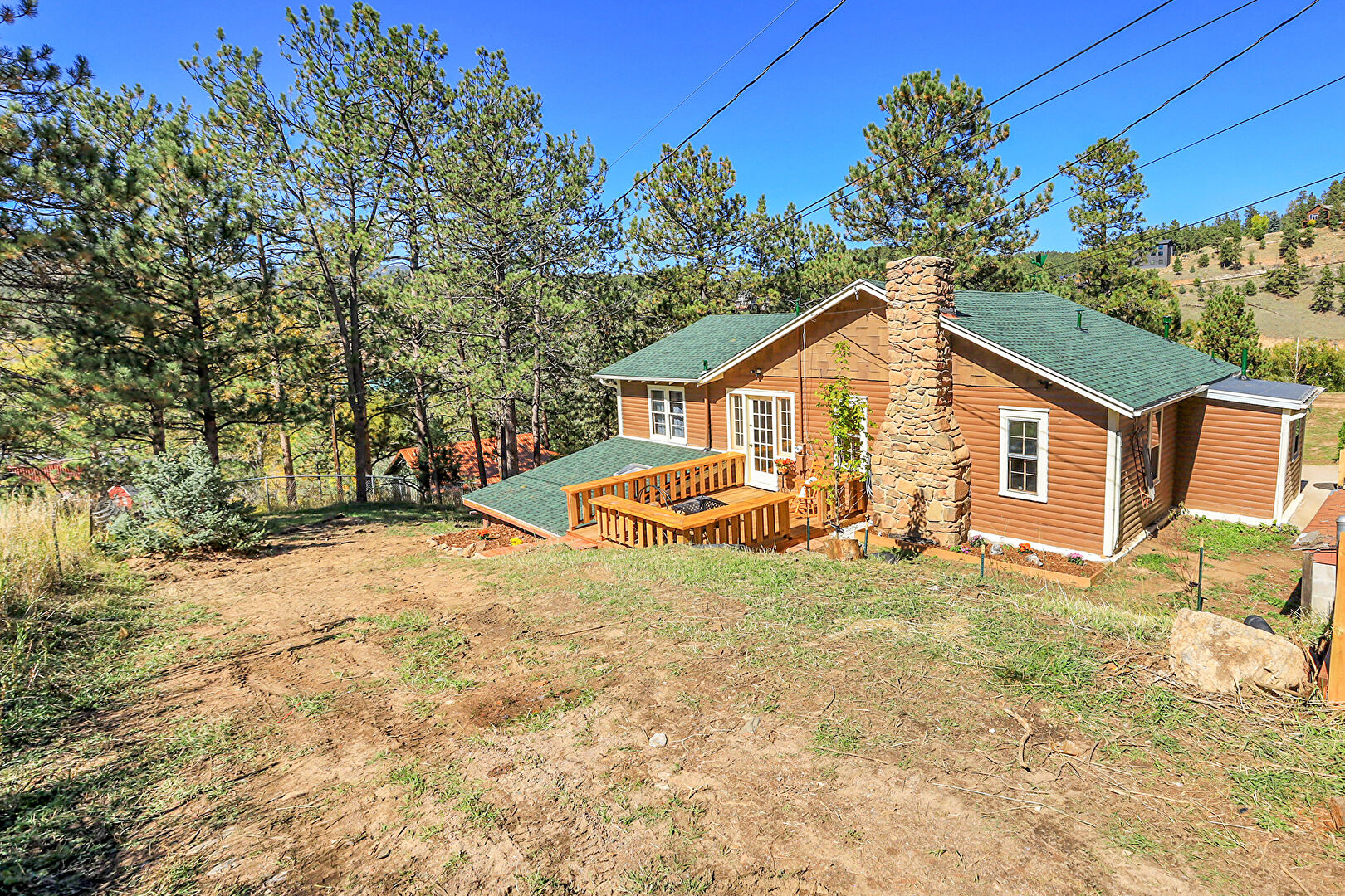 Property Exterior at 3425 Burnham Drive, Kittredge, CO 80457, listed by Pandora & John Erlandson, MLS ID: 778216