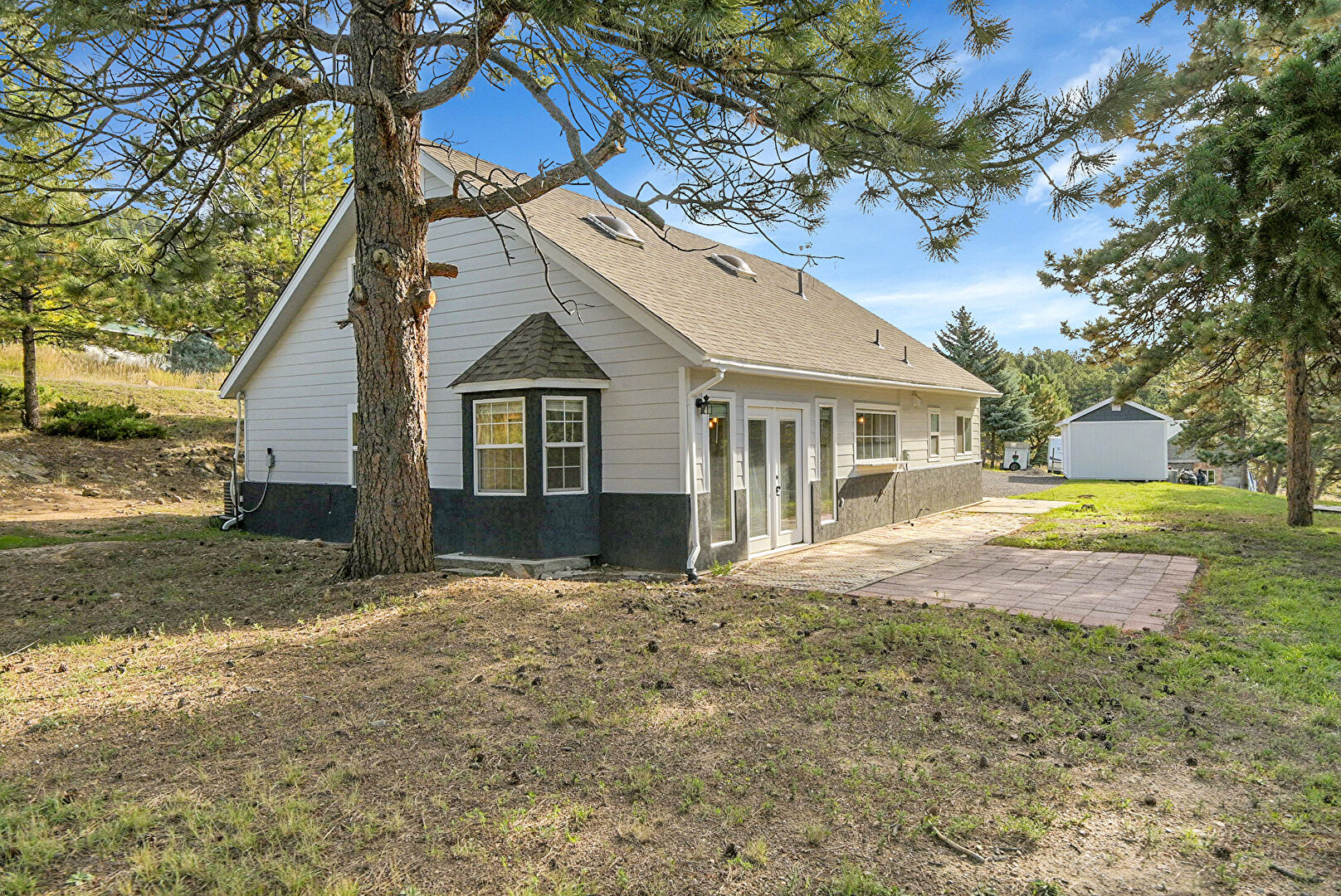 Back at 6554 High Circle, Morrison, CO 80465, listed by Sandra Bosworth