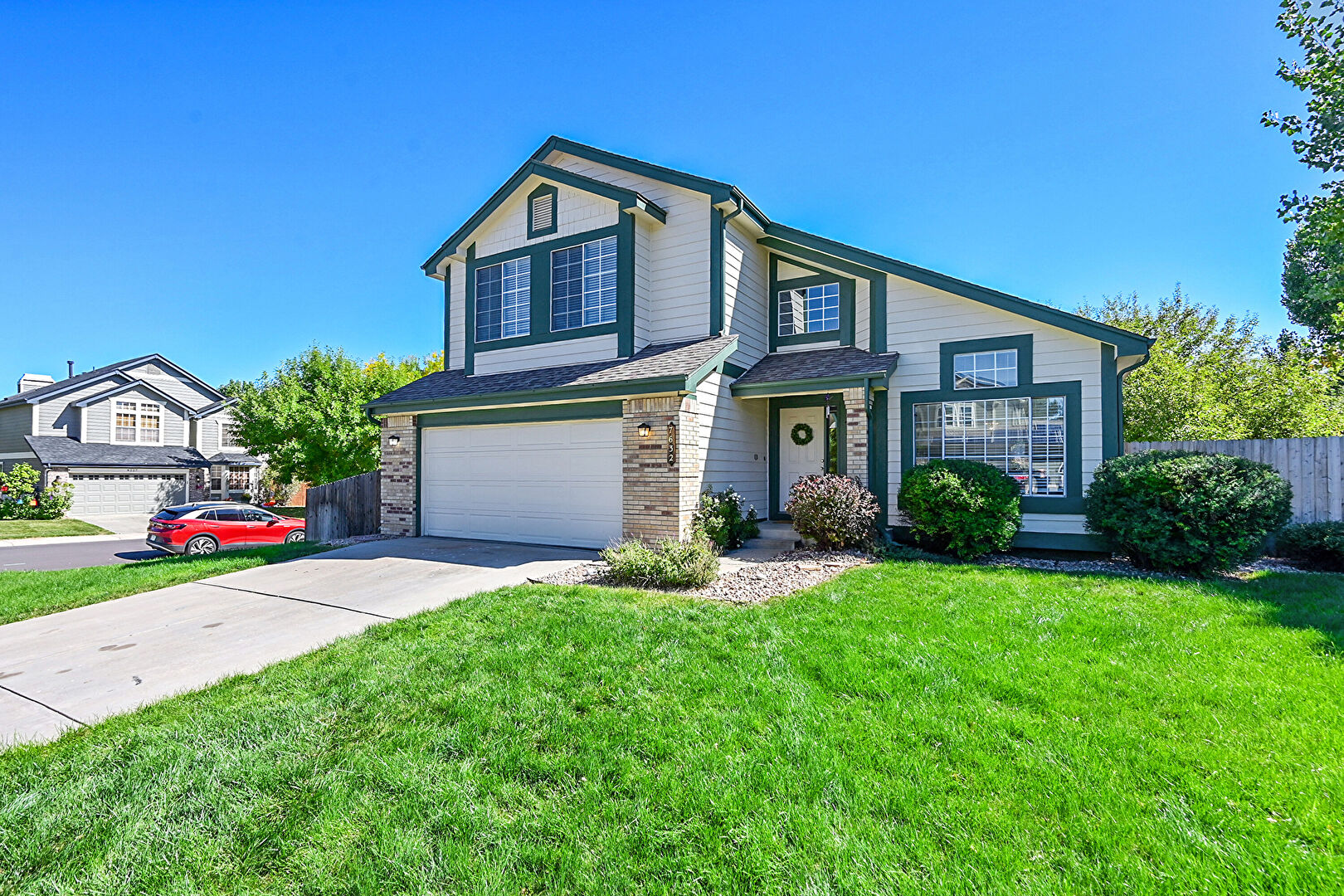 Front at 7632 South Balsam Court, Littleton, CO 80128, listed by Sandy Mazarakis & Stefan Burris