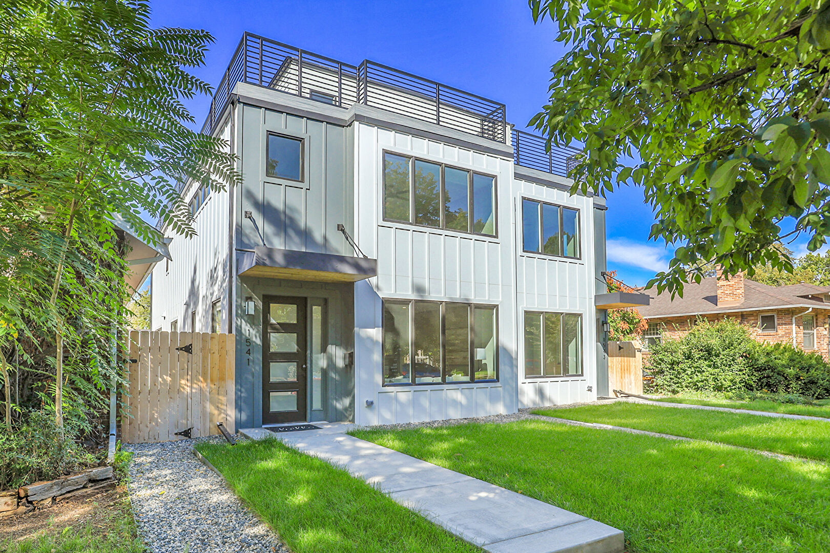 Front at 1541 Glencoe Street, Denver, CO 80220, listed by Brenda Moore