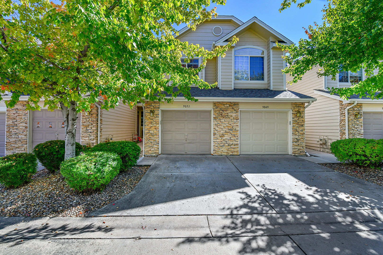 Front at 9051 West Phillips Drive, Littleton, CO 80128, listed by Luz Daniels