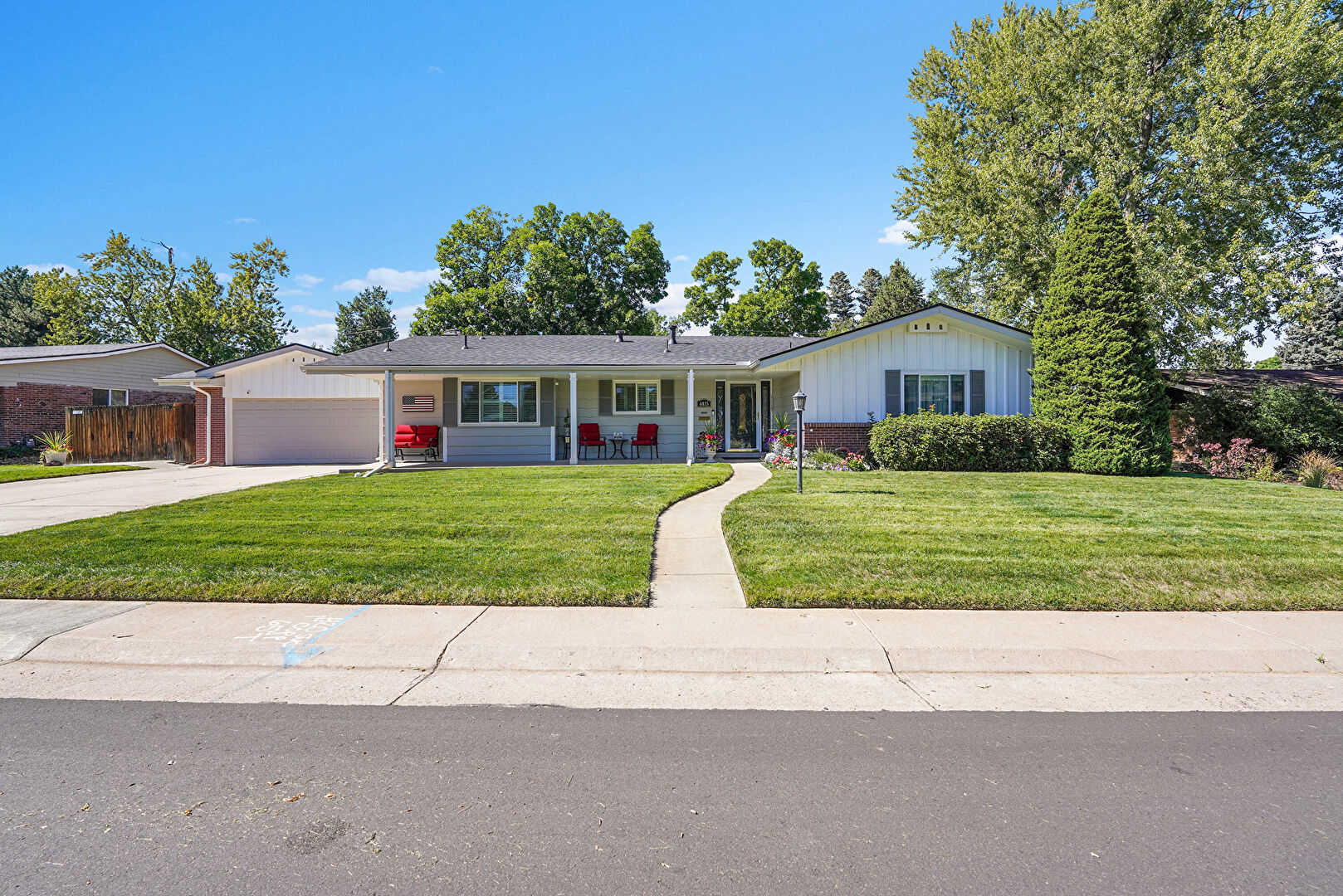 Front at 6835 South Adams Way, Centennial, CO 80122, listed by Mark Grandchamp
