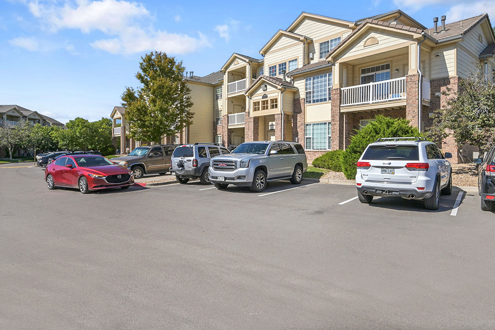 Parking at 5703 North Gibralter Way Unit 201, Aurora, CO 80019, listed by Taylor Haas