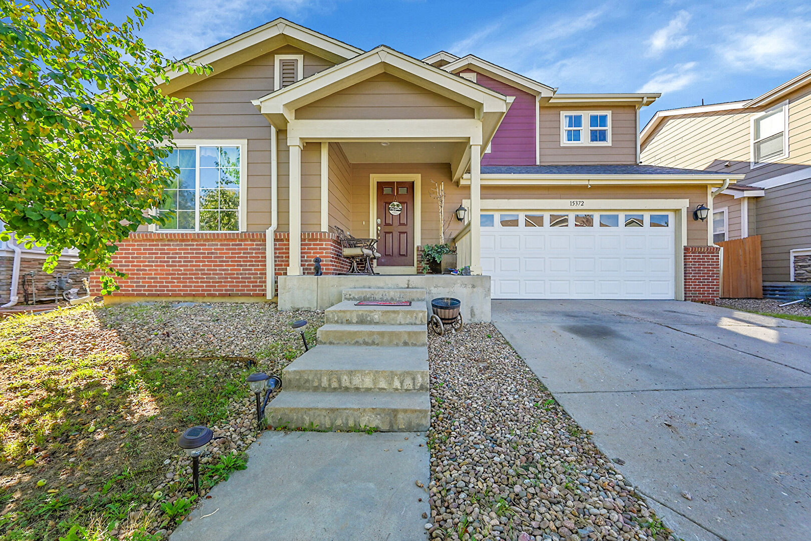 Front at 15372 East 100th Court, Commerce City, CO 80022, listed by Chris Greenburg